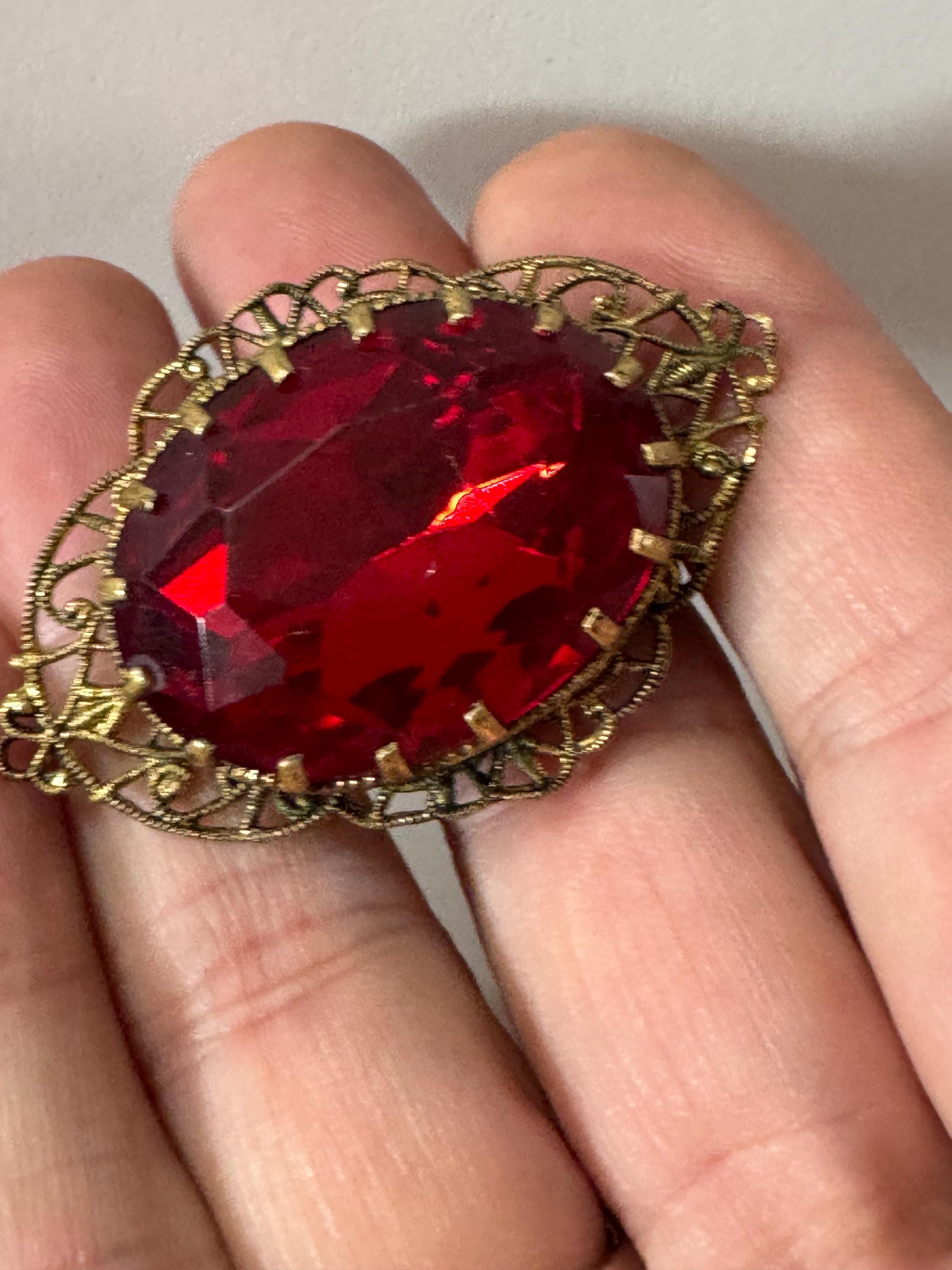 Antique Art Deco Czech brass gilt metal filigree brooch with red faux ruby glass paste rhinestones ornate
