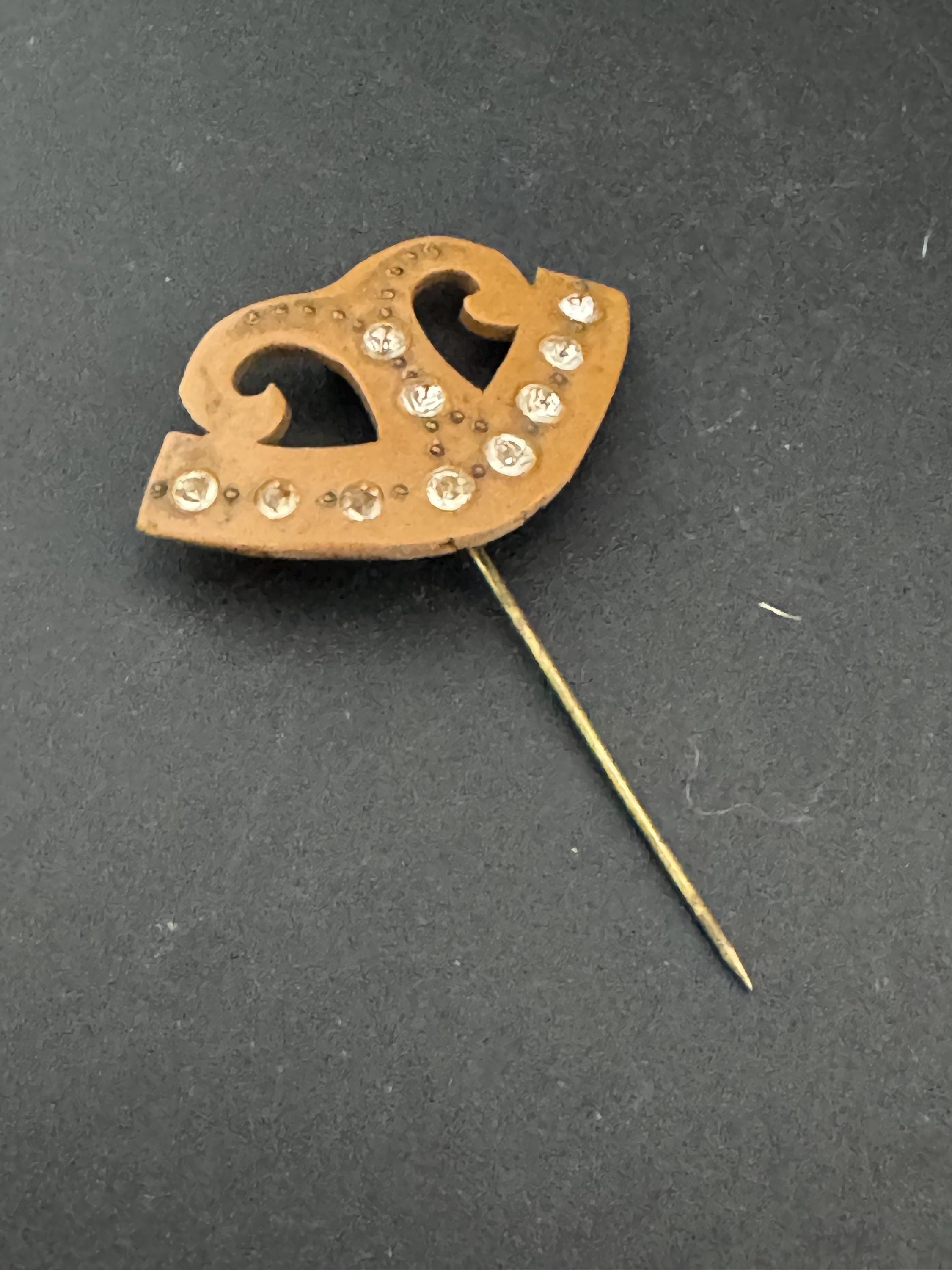 Brown early plastic hat flash pin with rhinestones paste brown pique work bakelite art deco