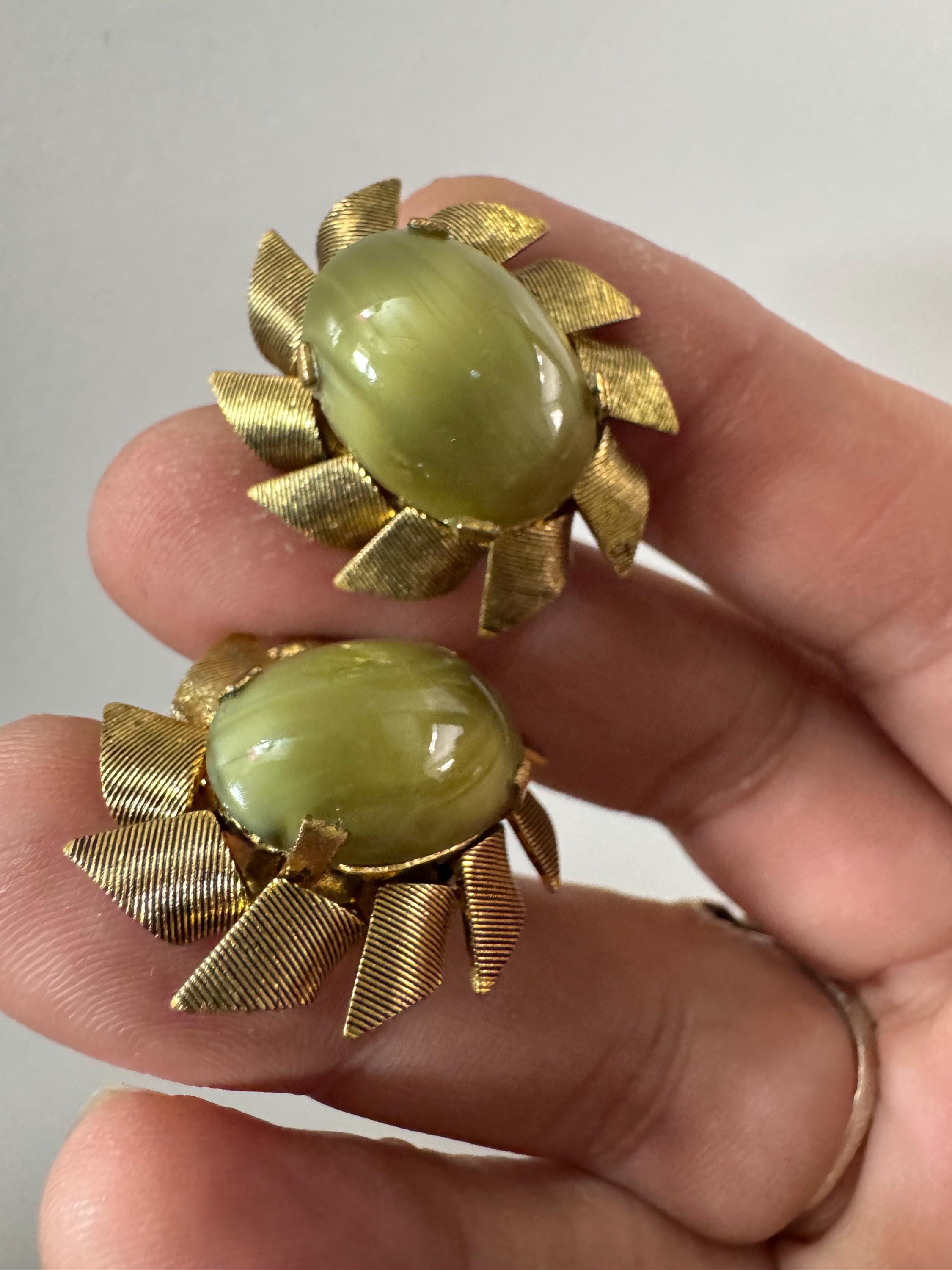 Vintage mid century green glass oval cabochon gold tone clip on earrings