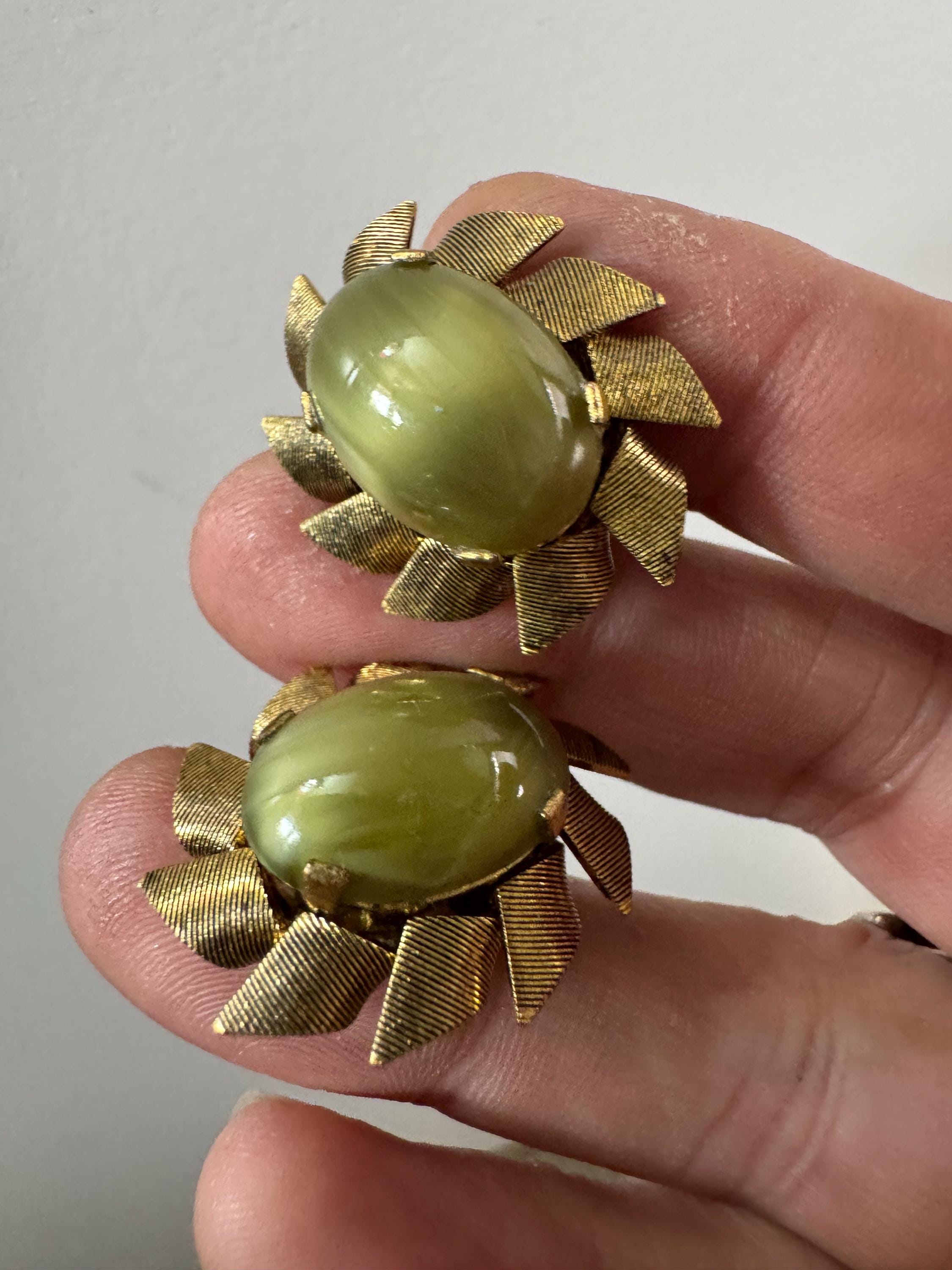 Vintage mid century green glass oval cabochon gold tone clip on earrings