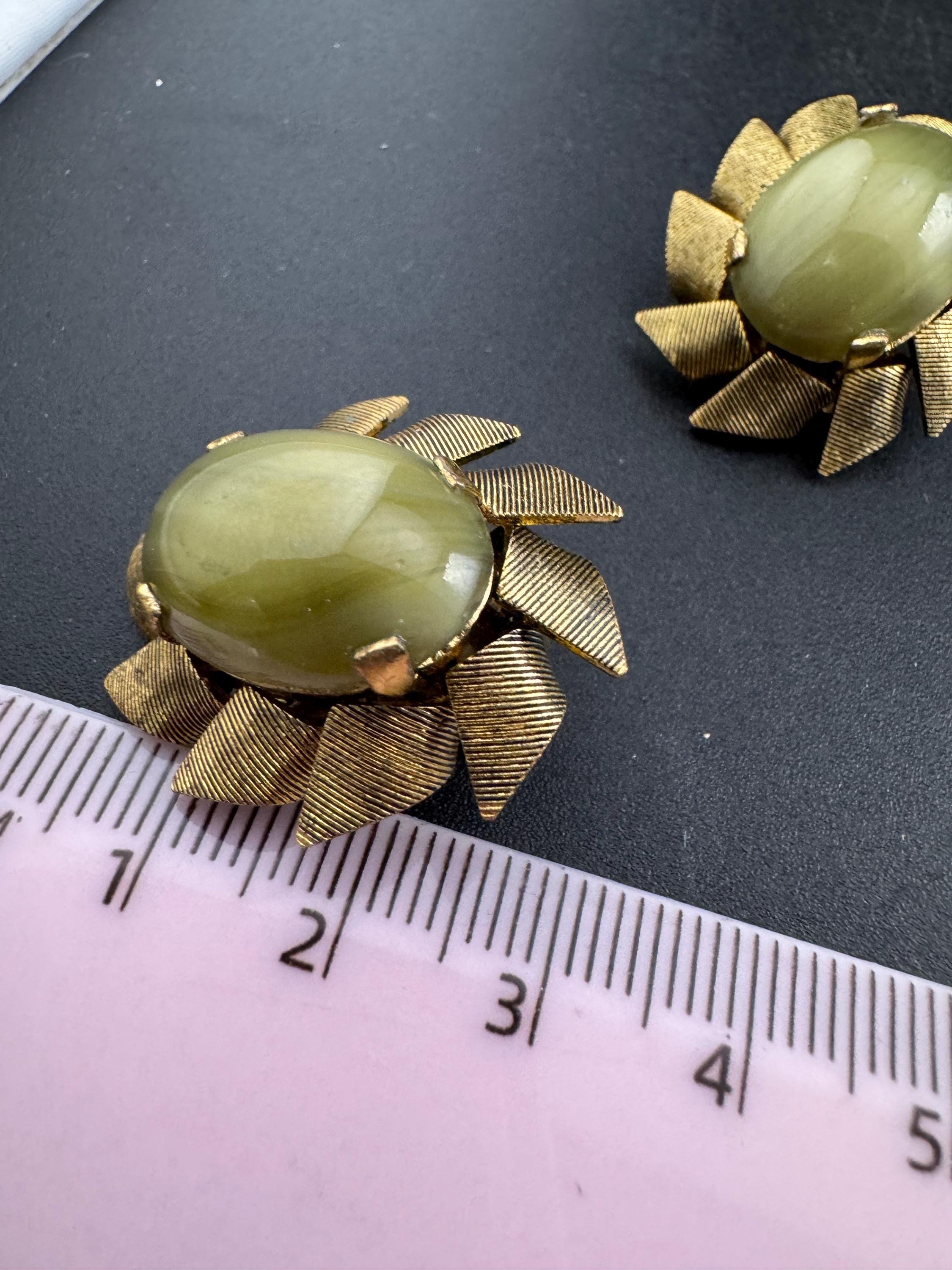 Vintage mid century green glass oval cabochon gold tone clip on earrings