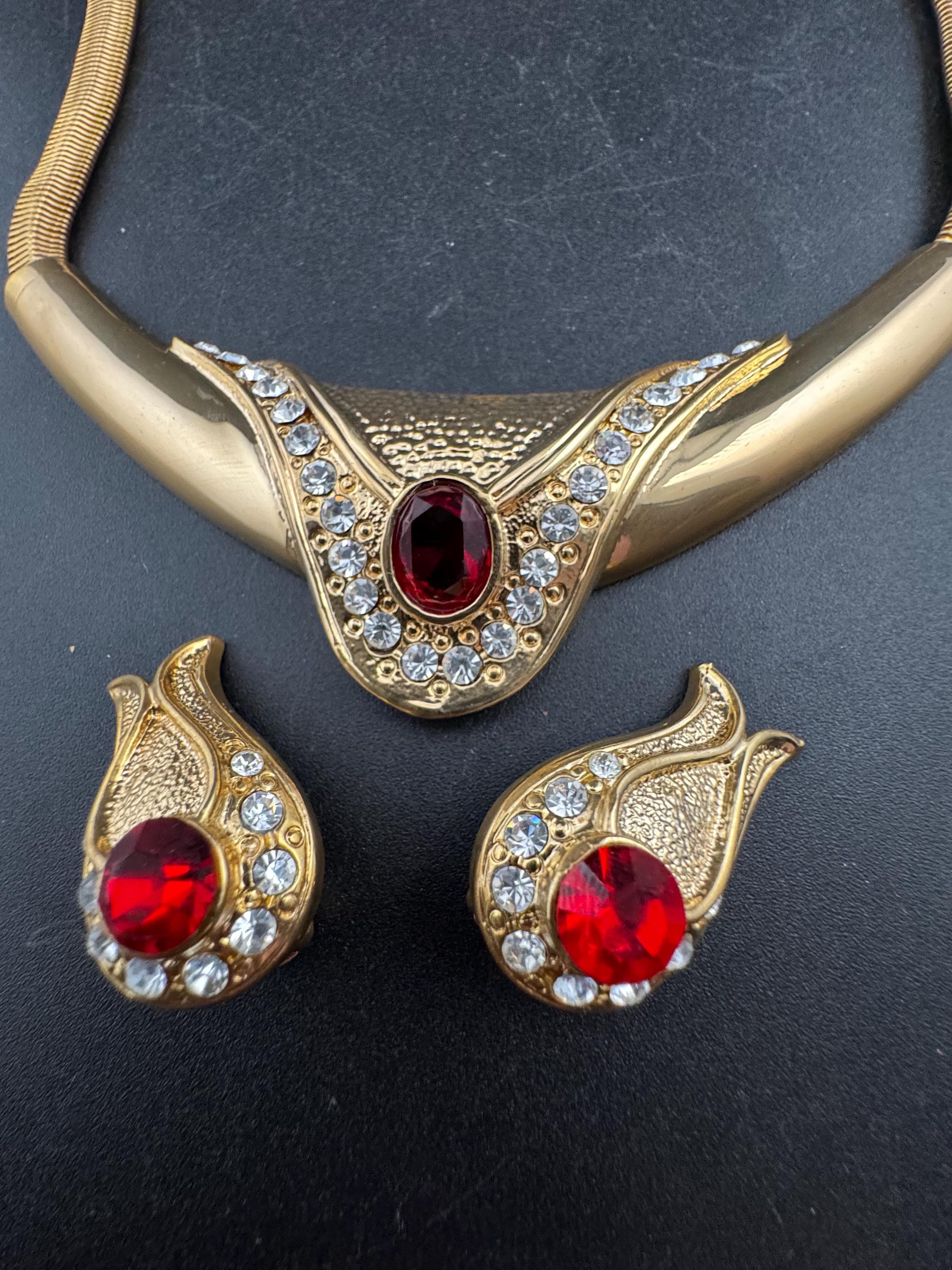 vintage 1980s high end ruby red and clear  crystal gold choker necklace and matching clip on earrings, unused retro jewelry set