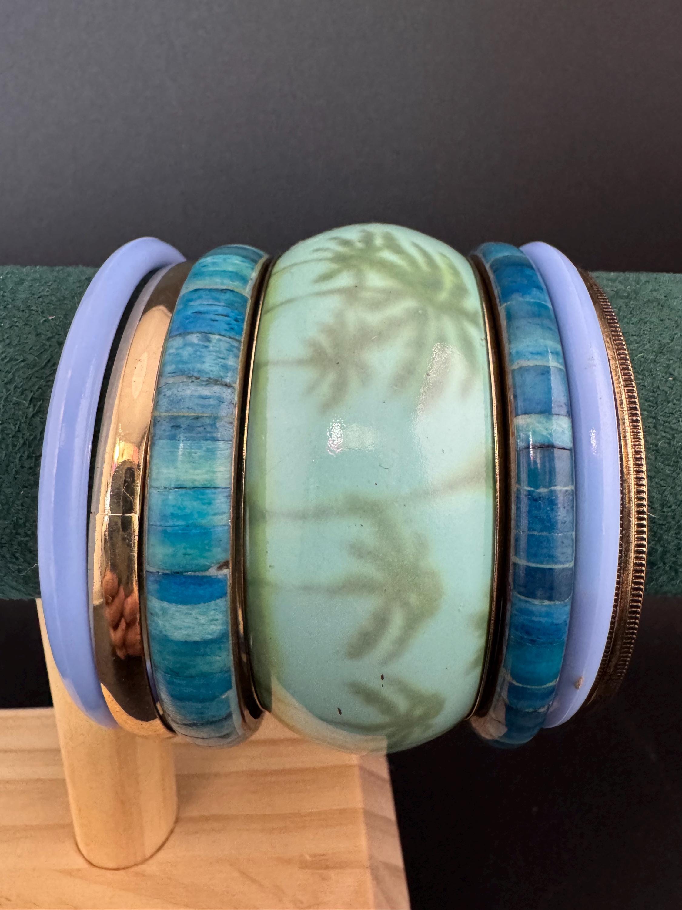 A curated set of BLUE vintage retro stack of plastic metal bangles bracelets