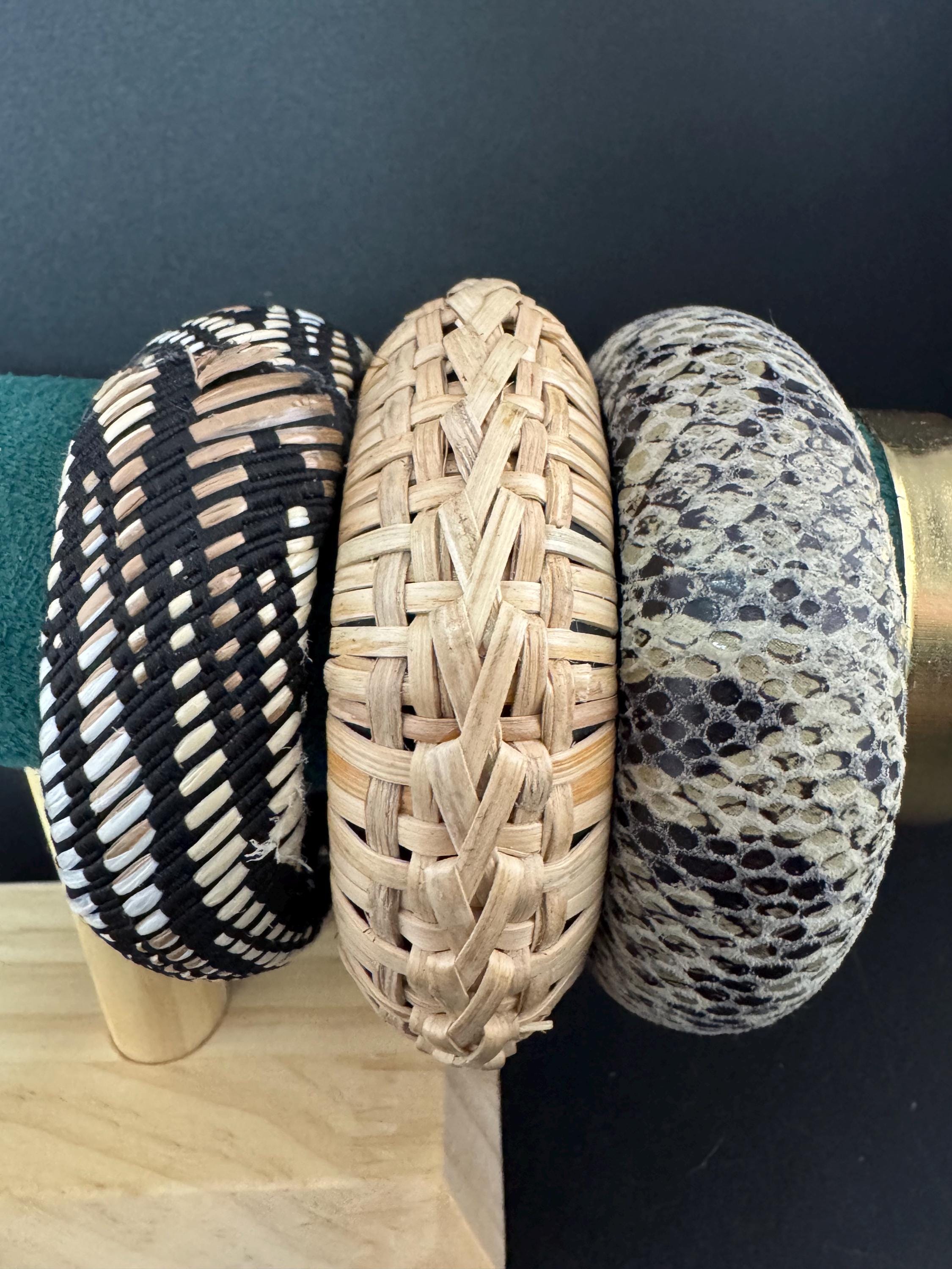 Curated stack of vintage wooden plastic and metal stacking bangles in brown natural shades ethnic tribal boho festival bracelets