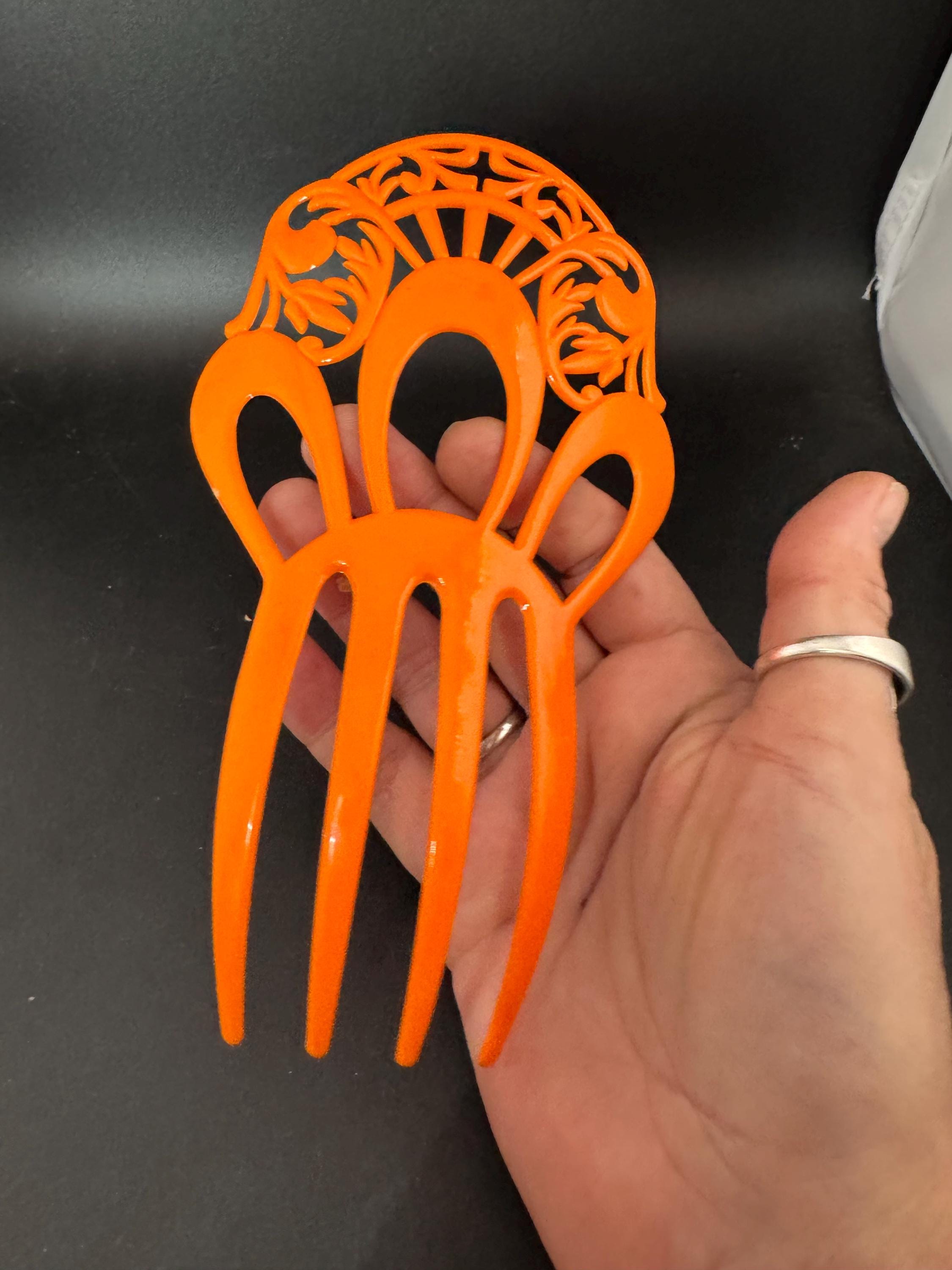 vintage large bright orange openwork plastic traditional Spanish peineta hair comb, mantilla