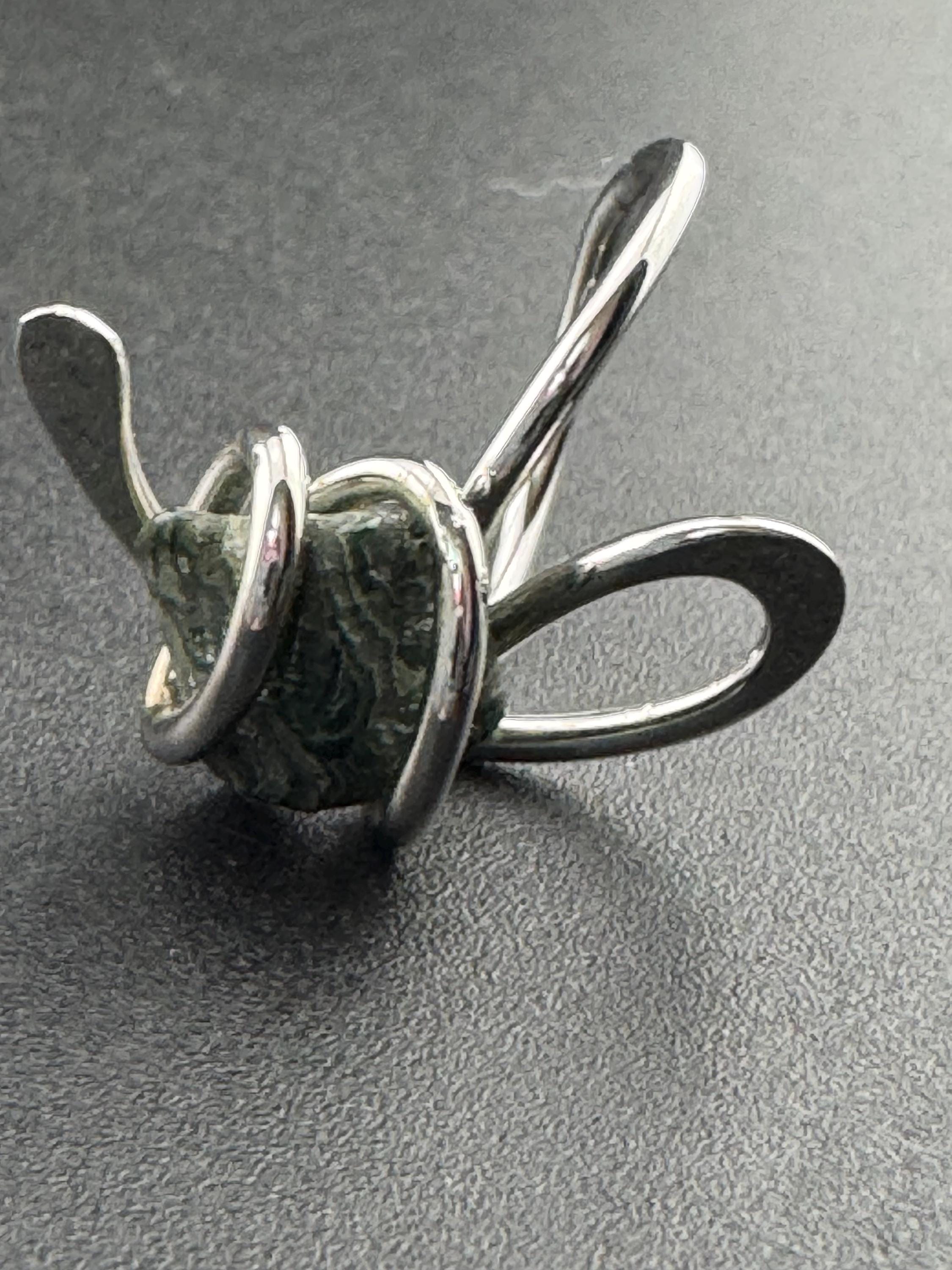 1970s vintage signed ASTRAHA modernist silver tone adjustable ring with central green gemstone