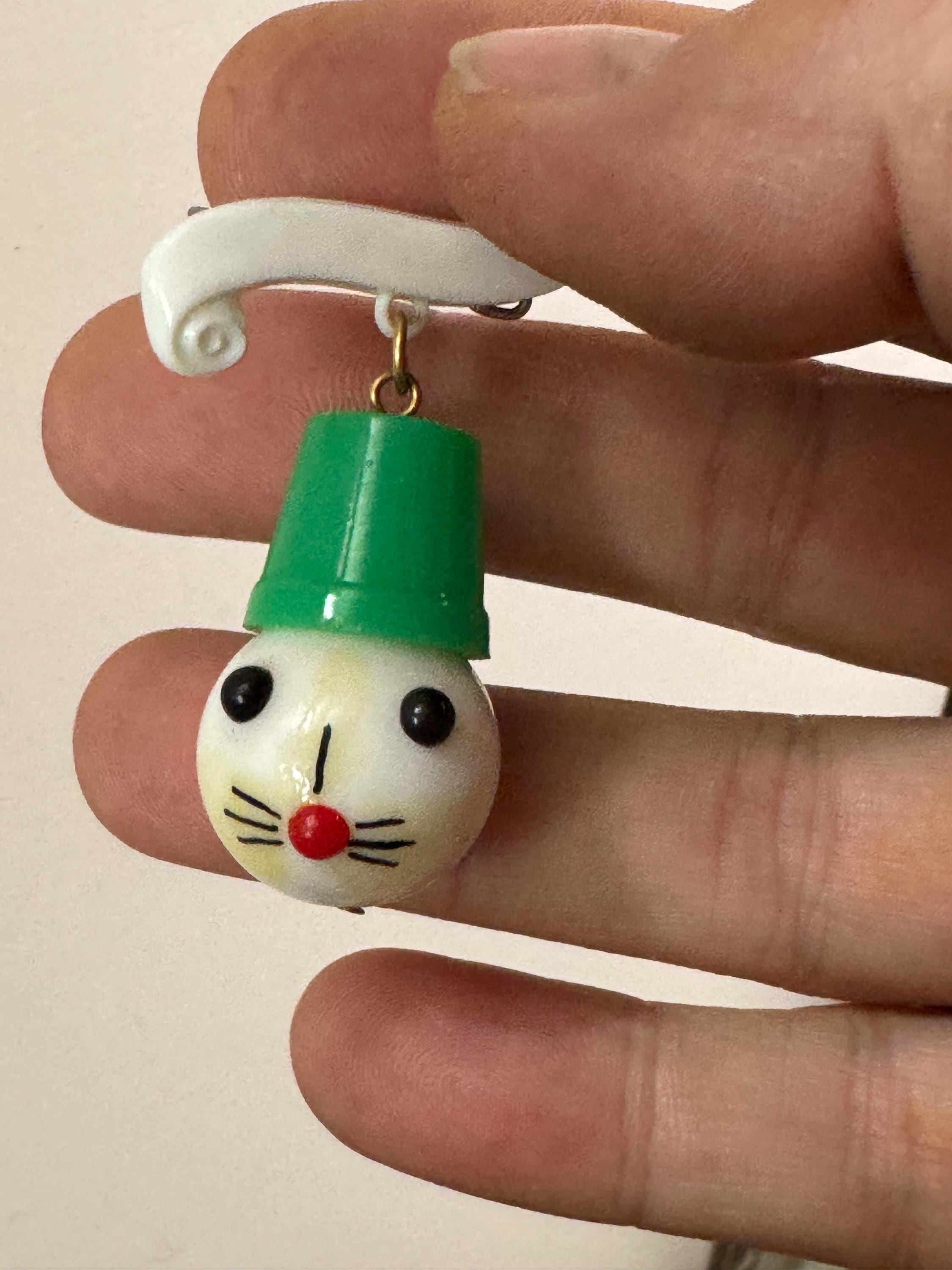 Vintage 1940s kitsch cute Early Plastic dangly rabbit or mouse in a green hat brooch