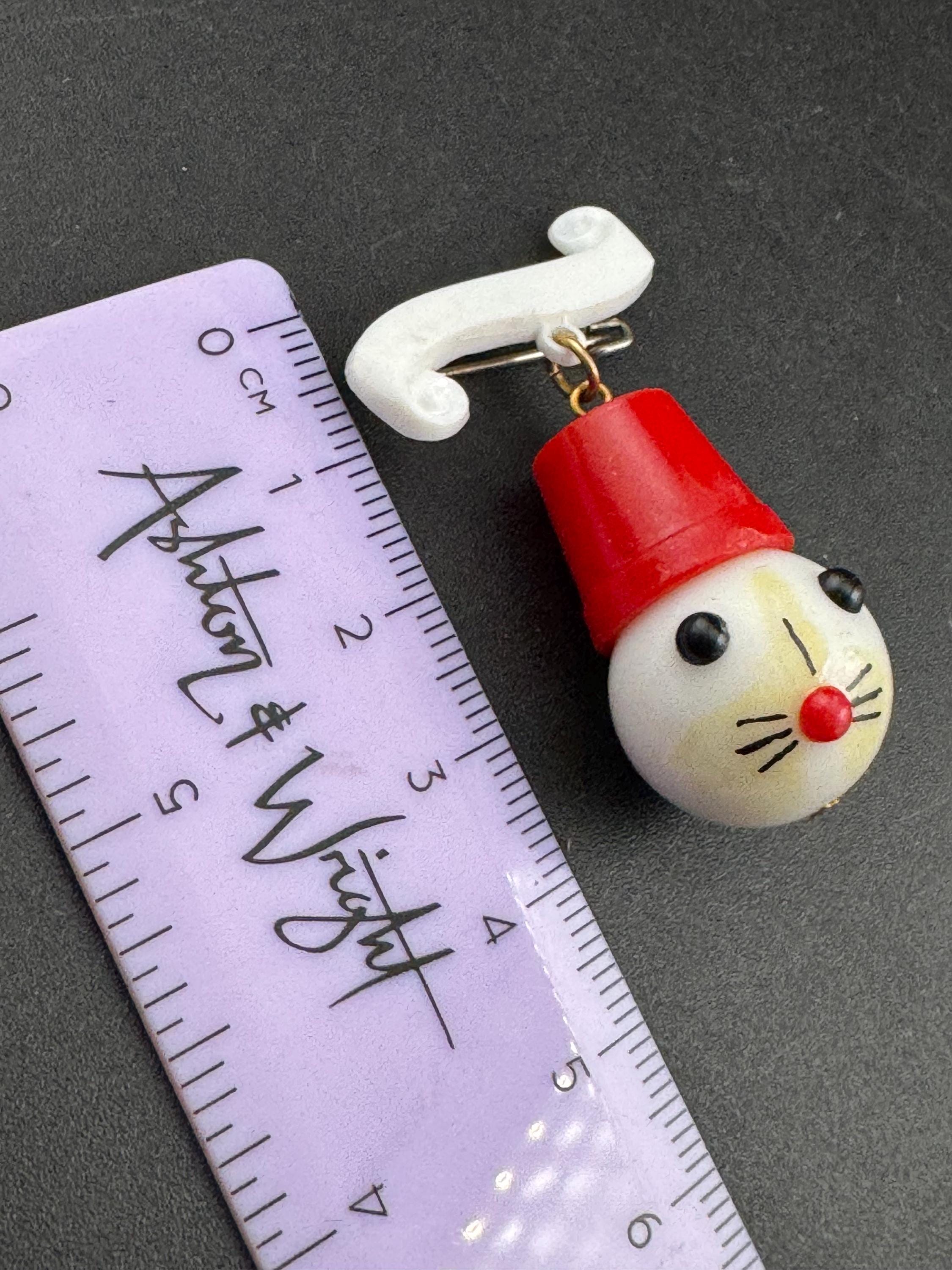 Vintage 1940s kitsch cute Early Plastic dangly rabbit or mouse in a red hat brooch