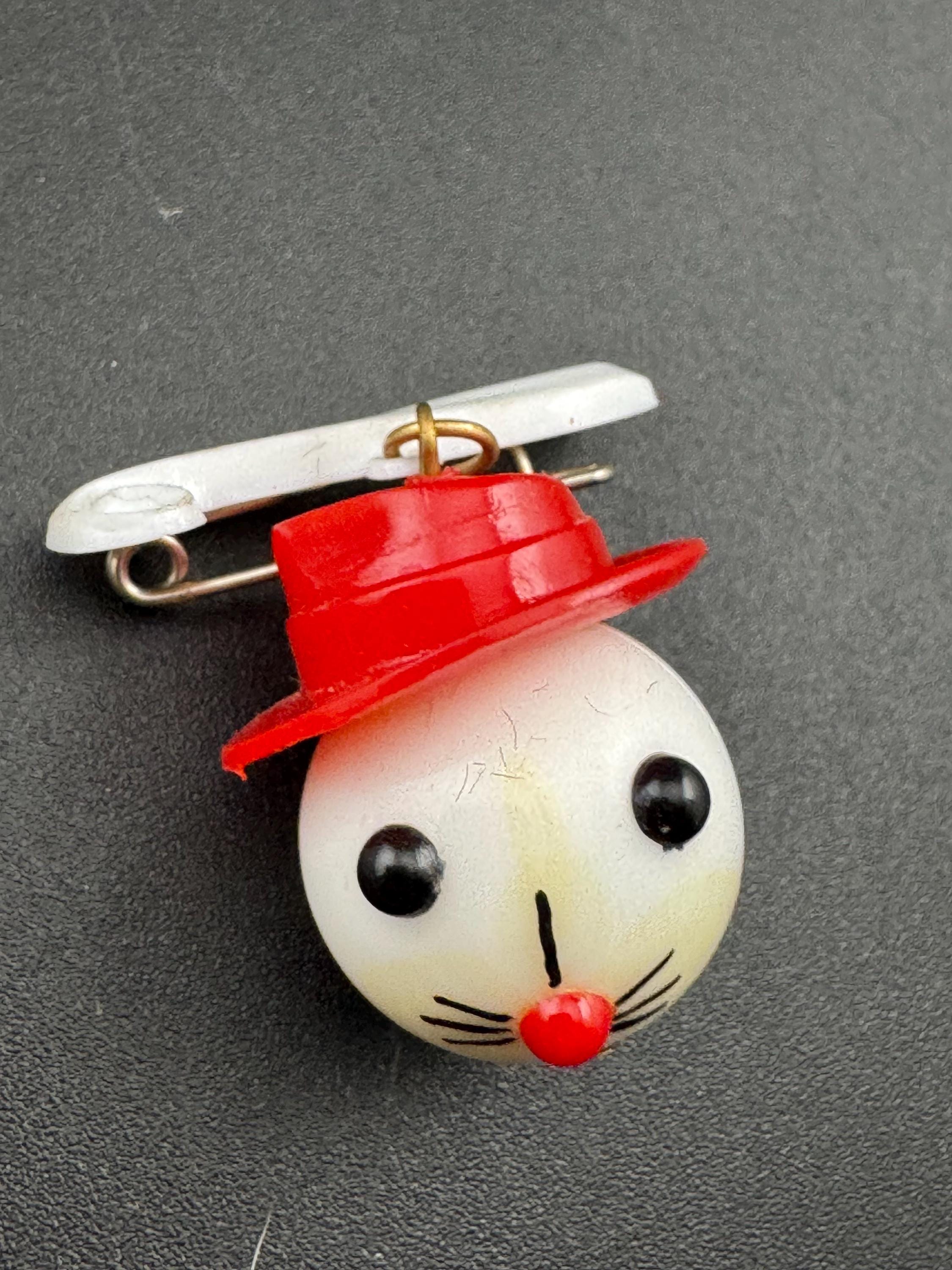 Vintage 1940s kitsch cute Early Plastic dangly rabbit or mouse in a red hat brooch