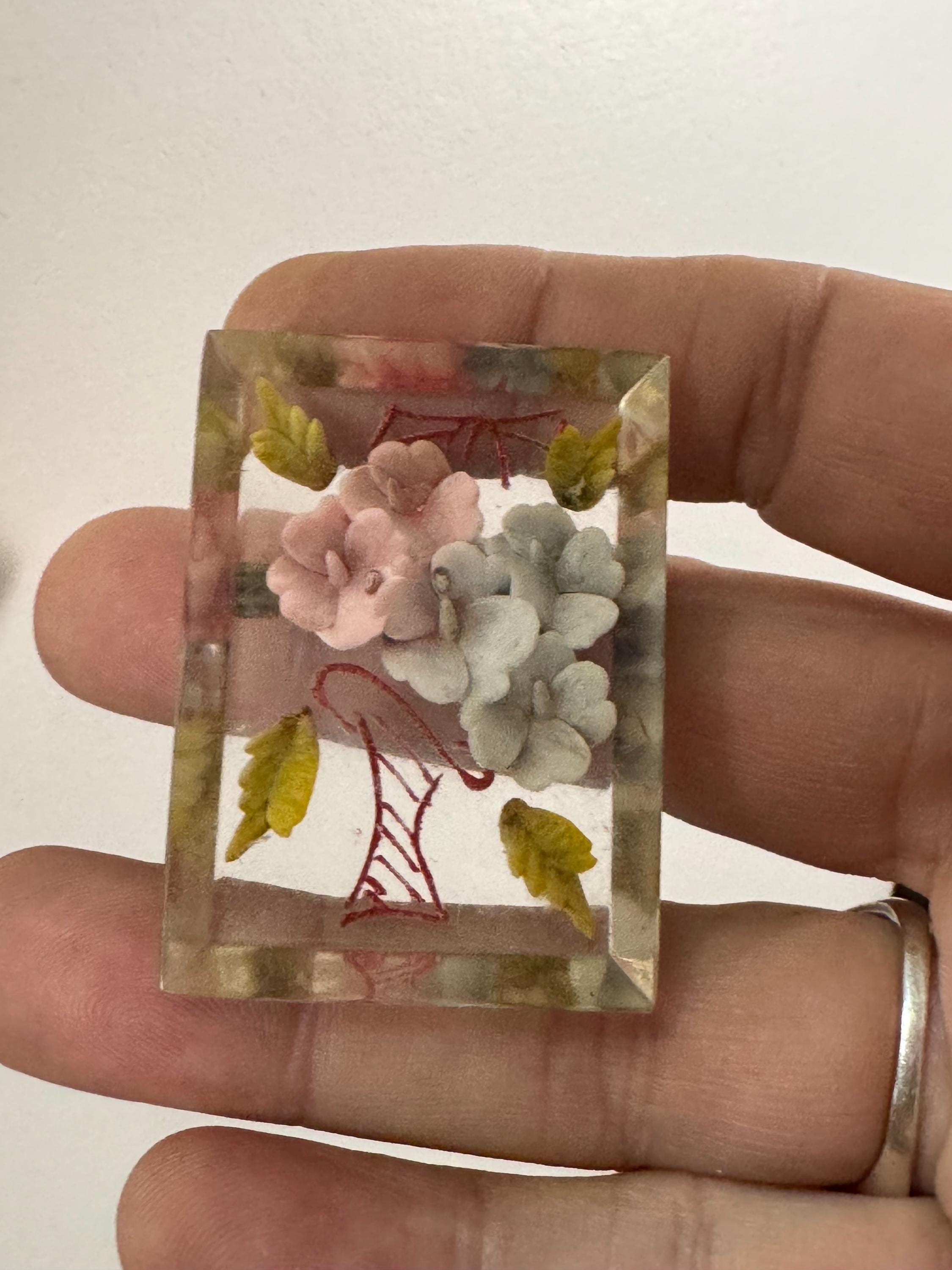 pink floral lucite brooch early plastic pink blue celluloid 1930s Vintage reverse carved