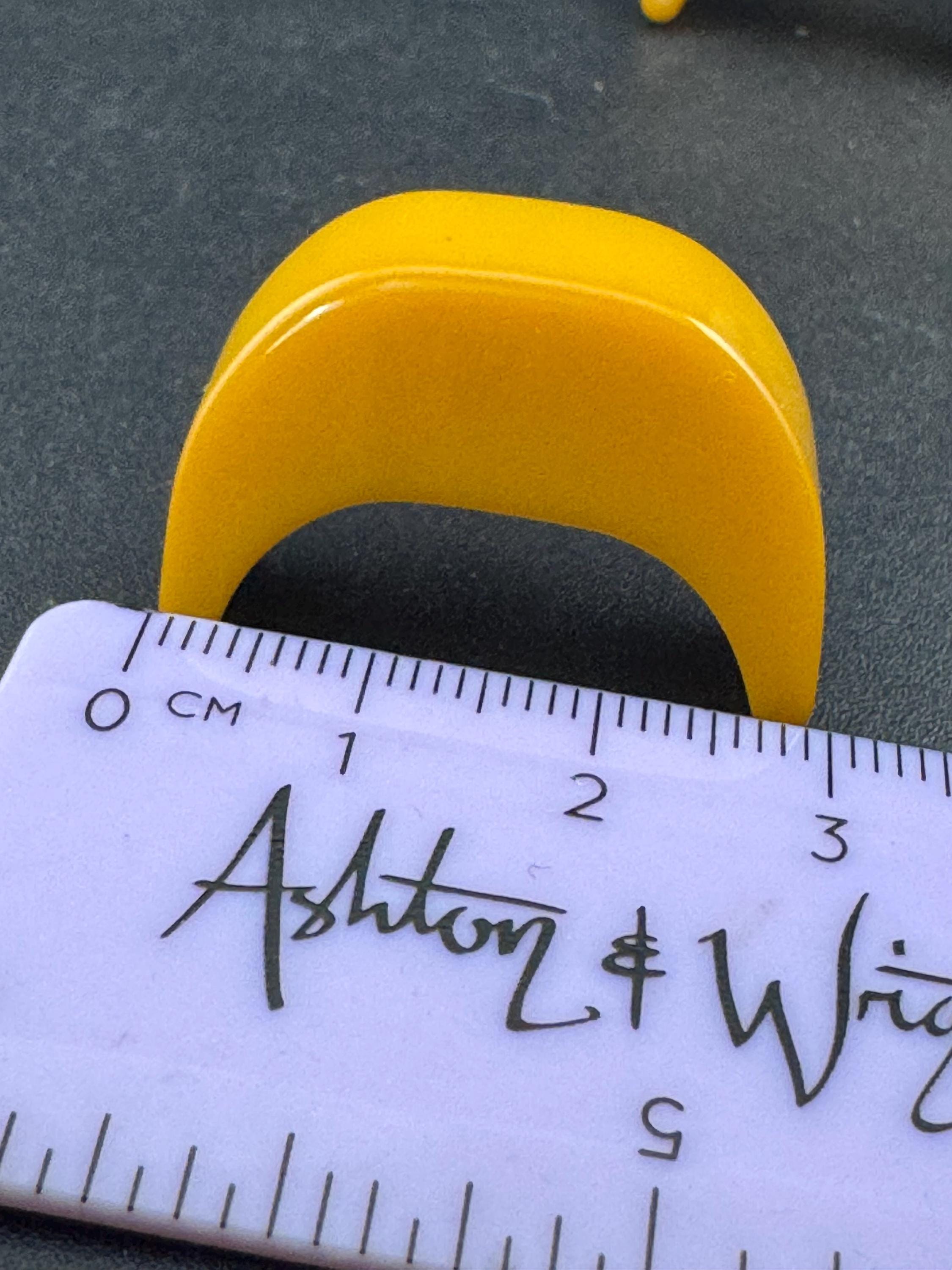 Vintage 1950s 1960s mustard yellow early plastic Clip On Earrings, modernist design