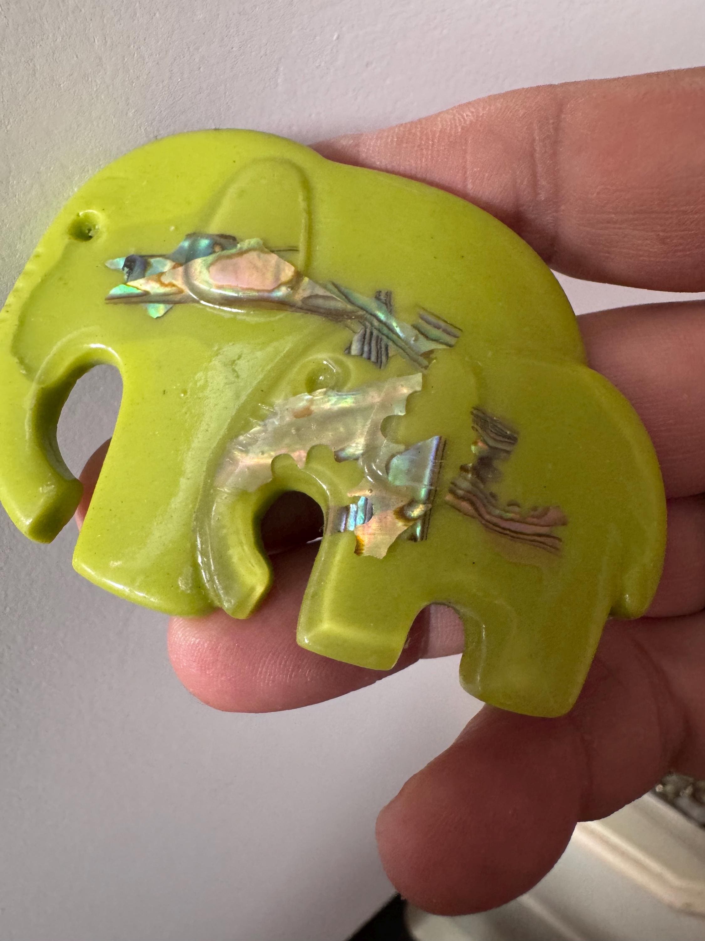 big lime green elephant and baby brooch inset with abalone shell, early plastic 1960s