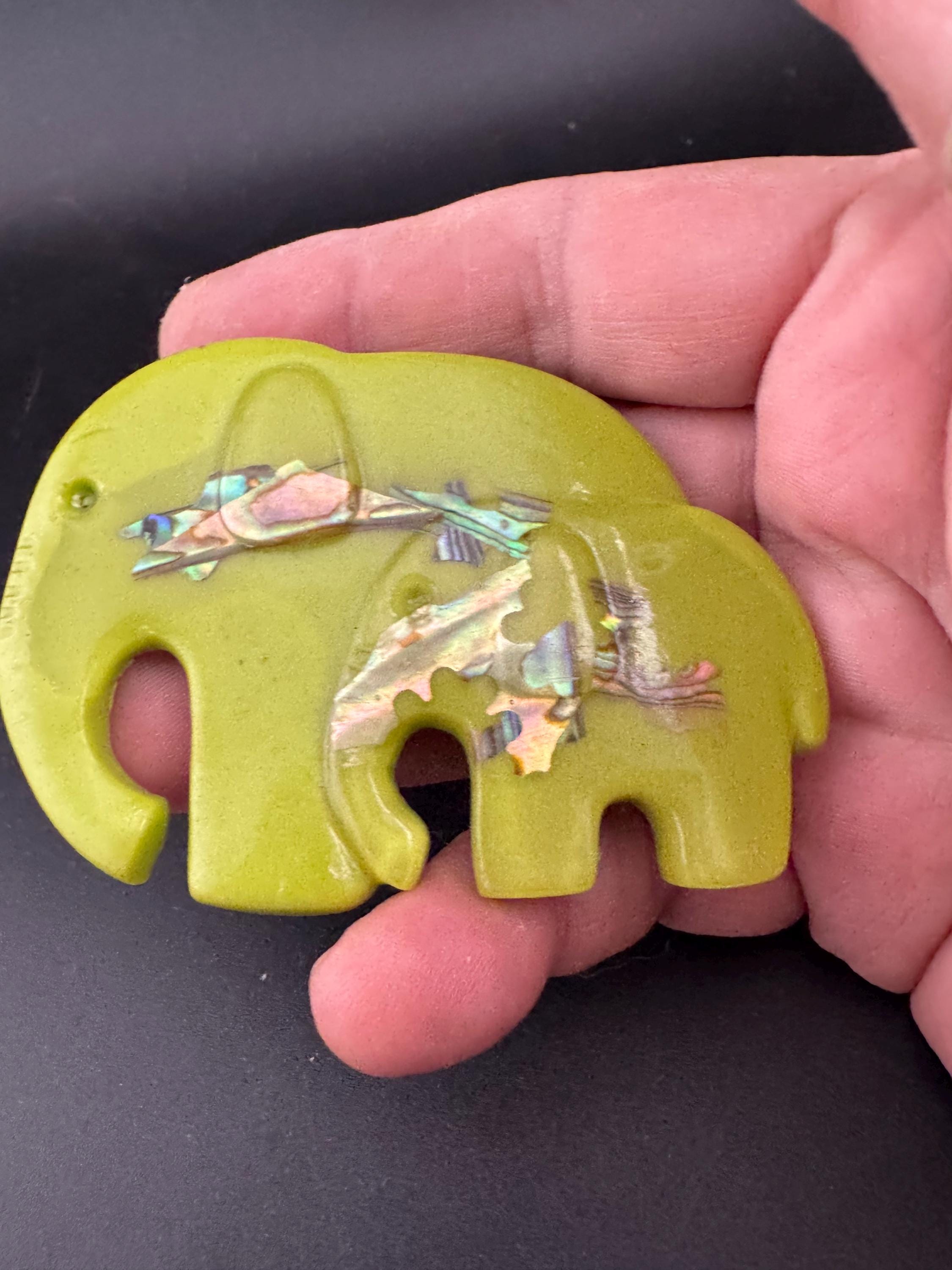 big lime green elephant and baby brooch inset with abalone shell, early plastic 1960s