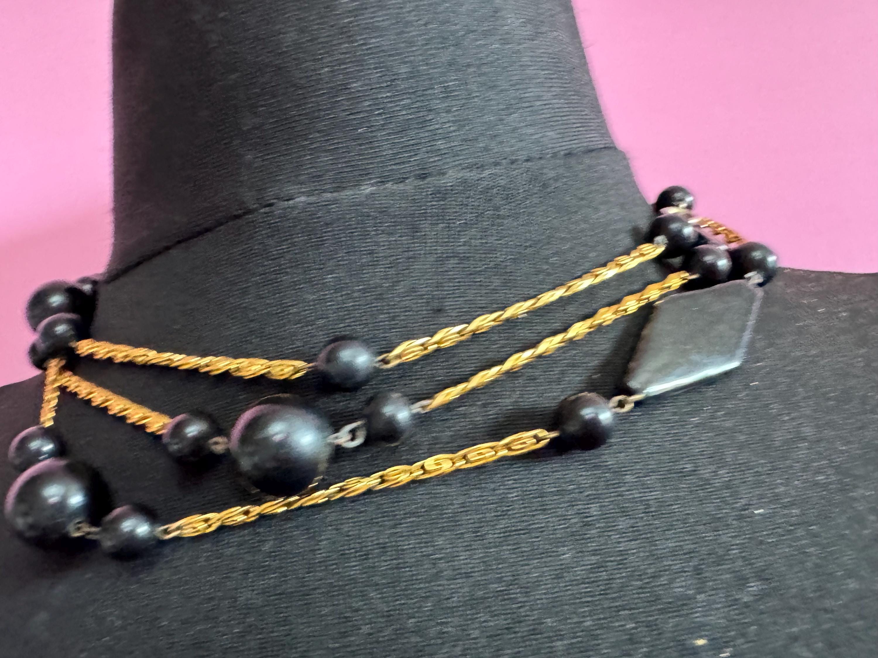 vintage 142cm long 1980s gold tone  scroll chain link black beaded station necklace