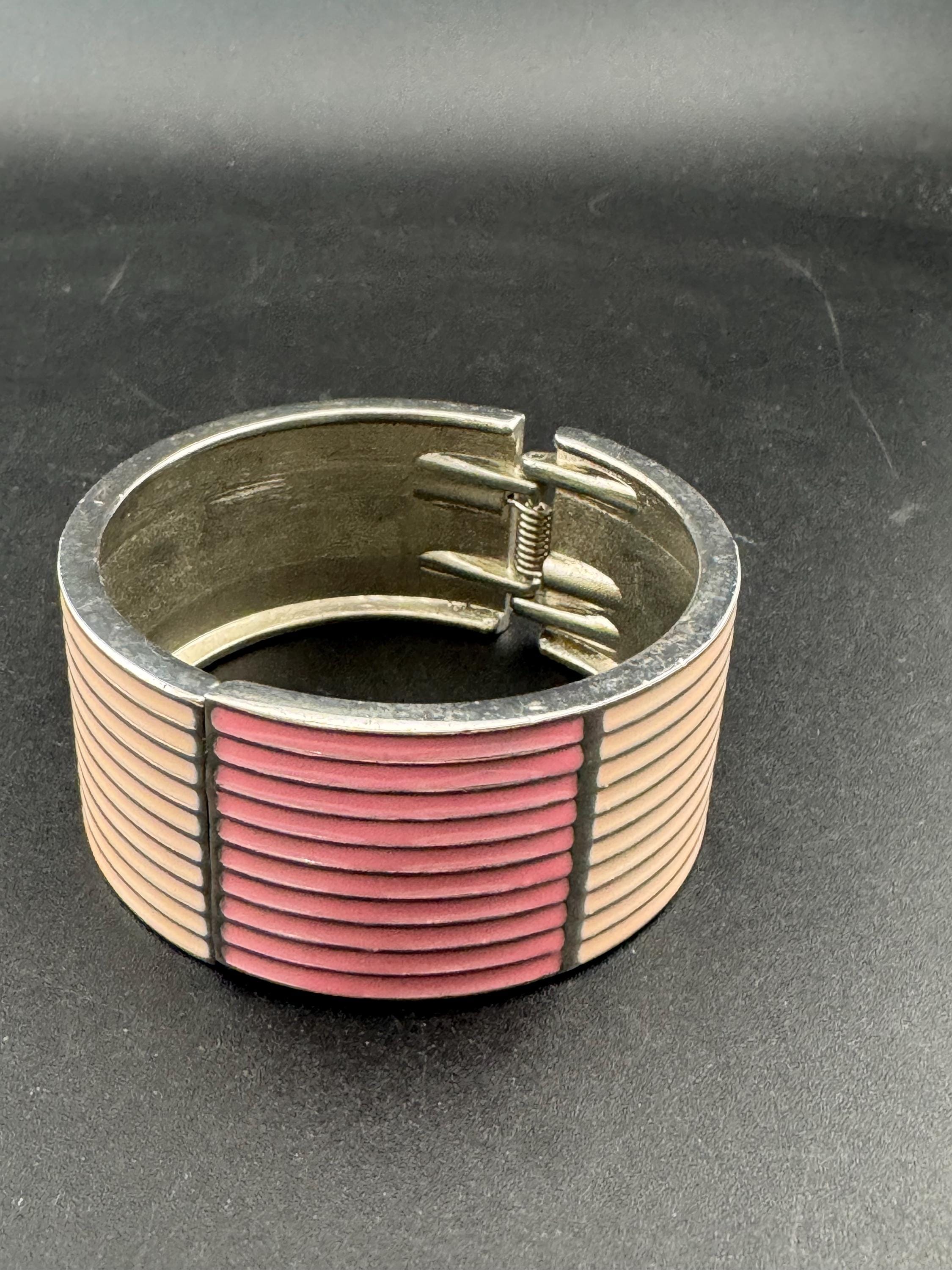 Vintage wide silver tone hinged pink enamel clamper bangle bracelet