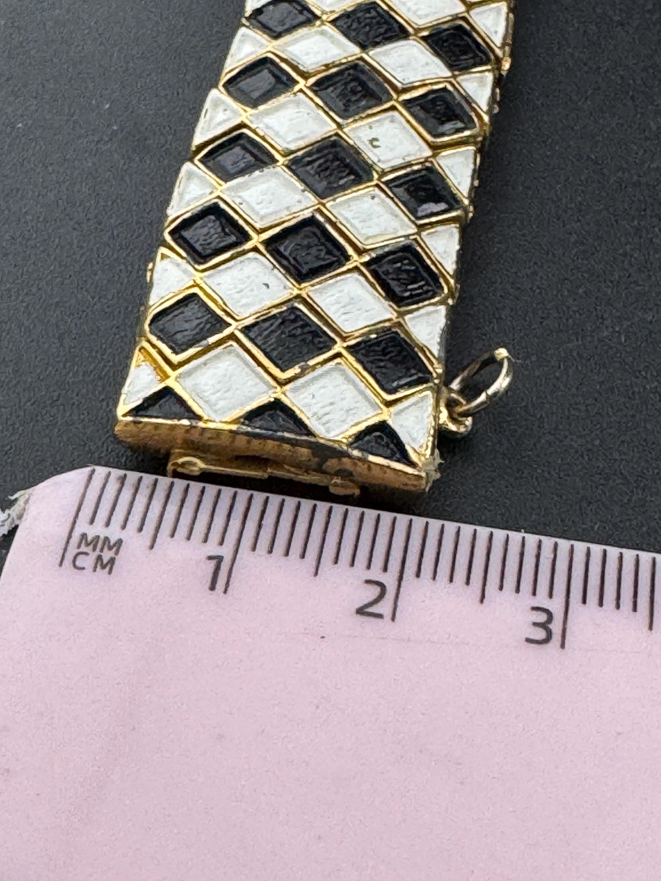 Vintage gold tone monochrome black and white harlequin enamel panel link wide bracelet