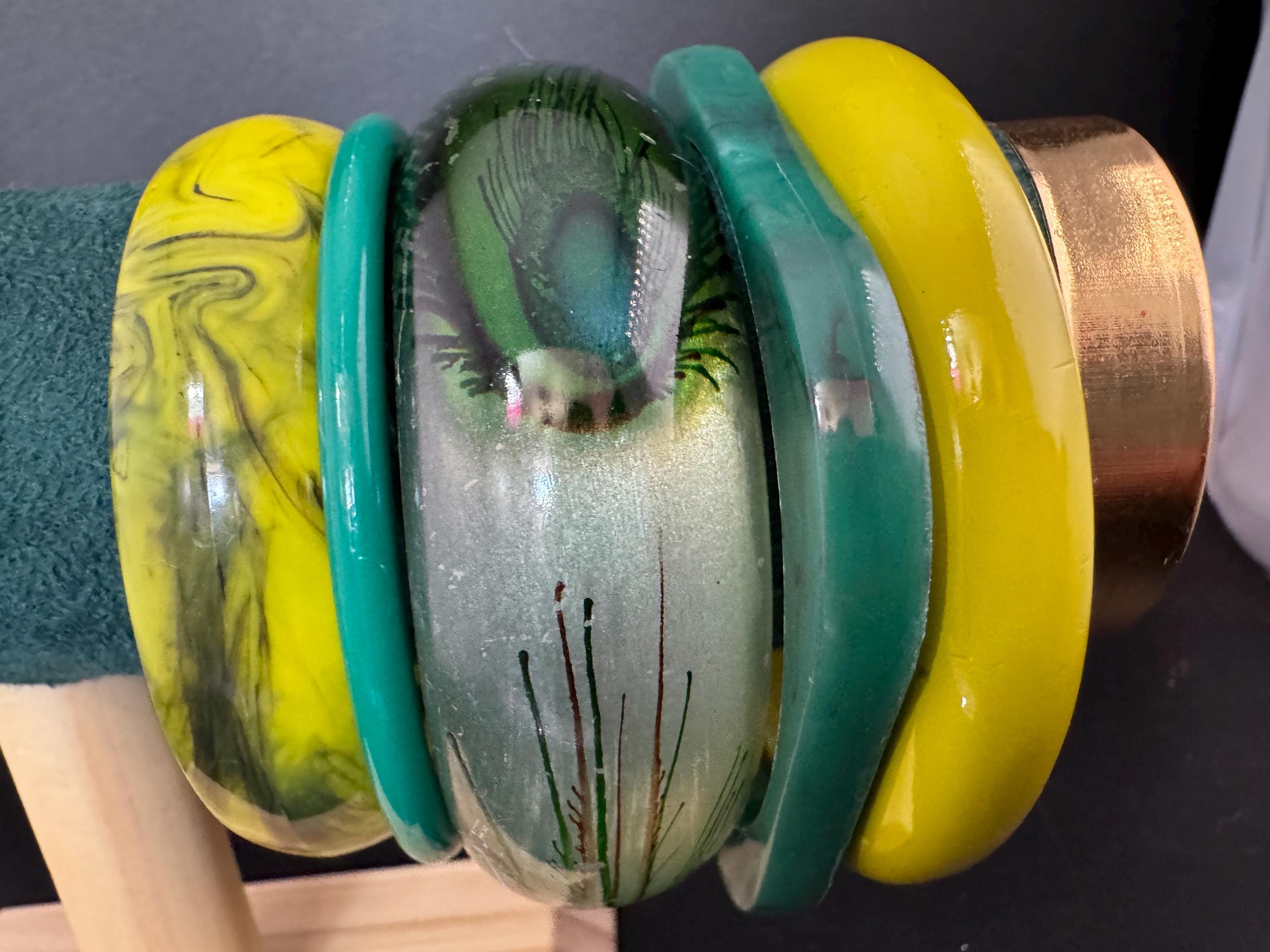 Vintage and retro curated stack of GREEN plastic acrylic bangles, bracelets