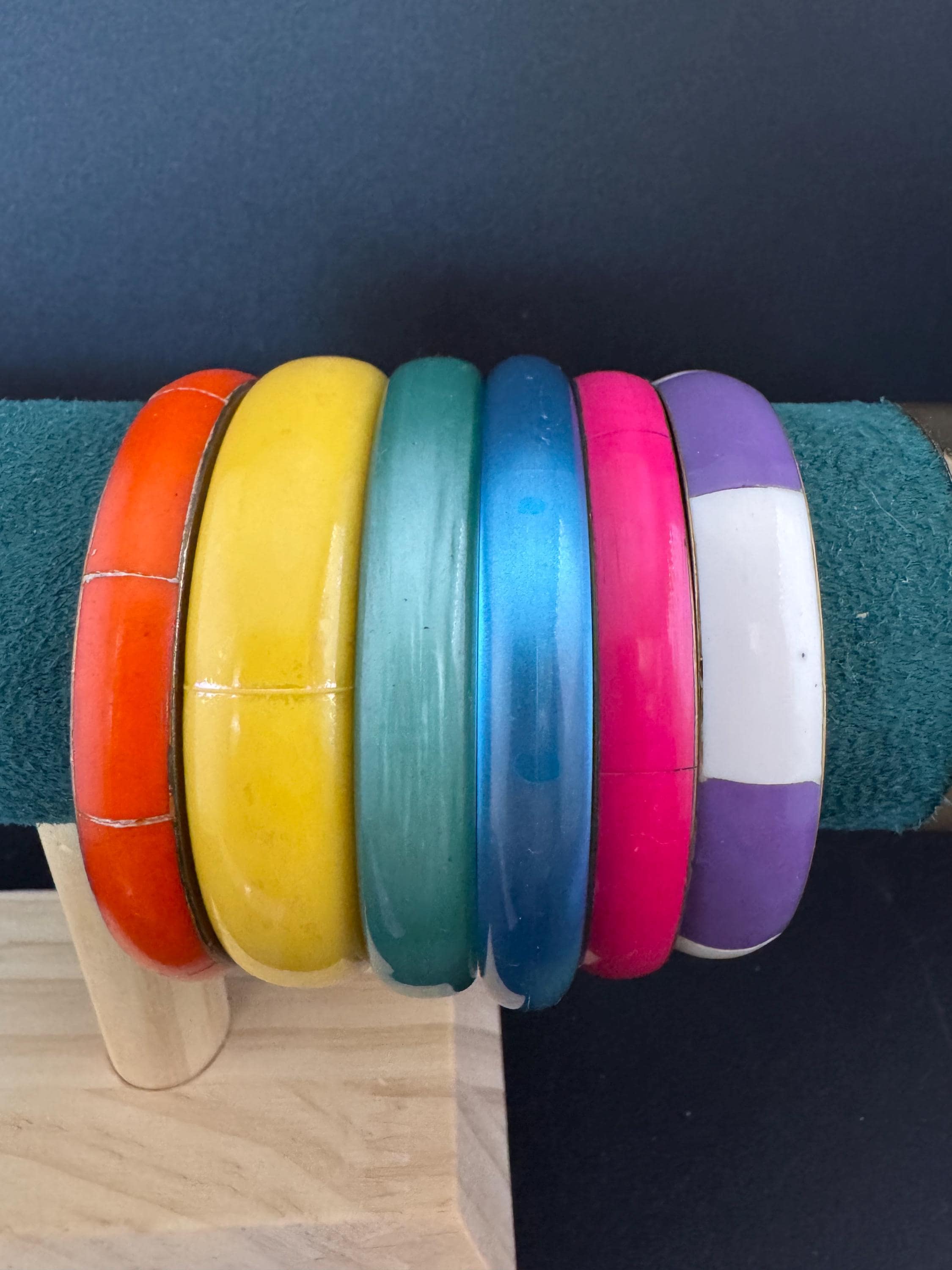 A curated stack of RAINBOW vintage Retro plastic metal coloured bangles