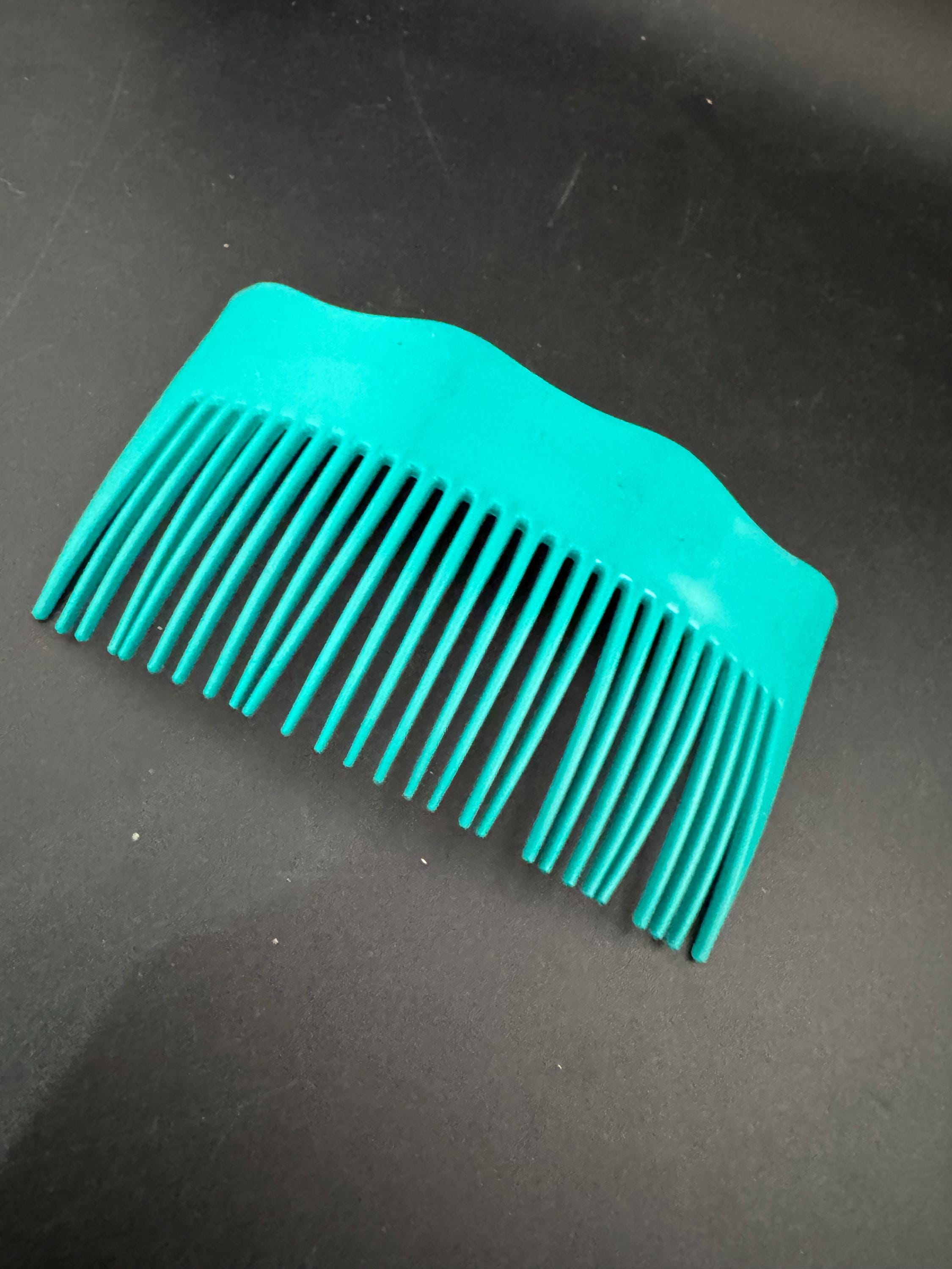 Vintage wide bright teal green plastic hair comb