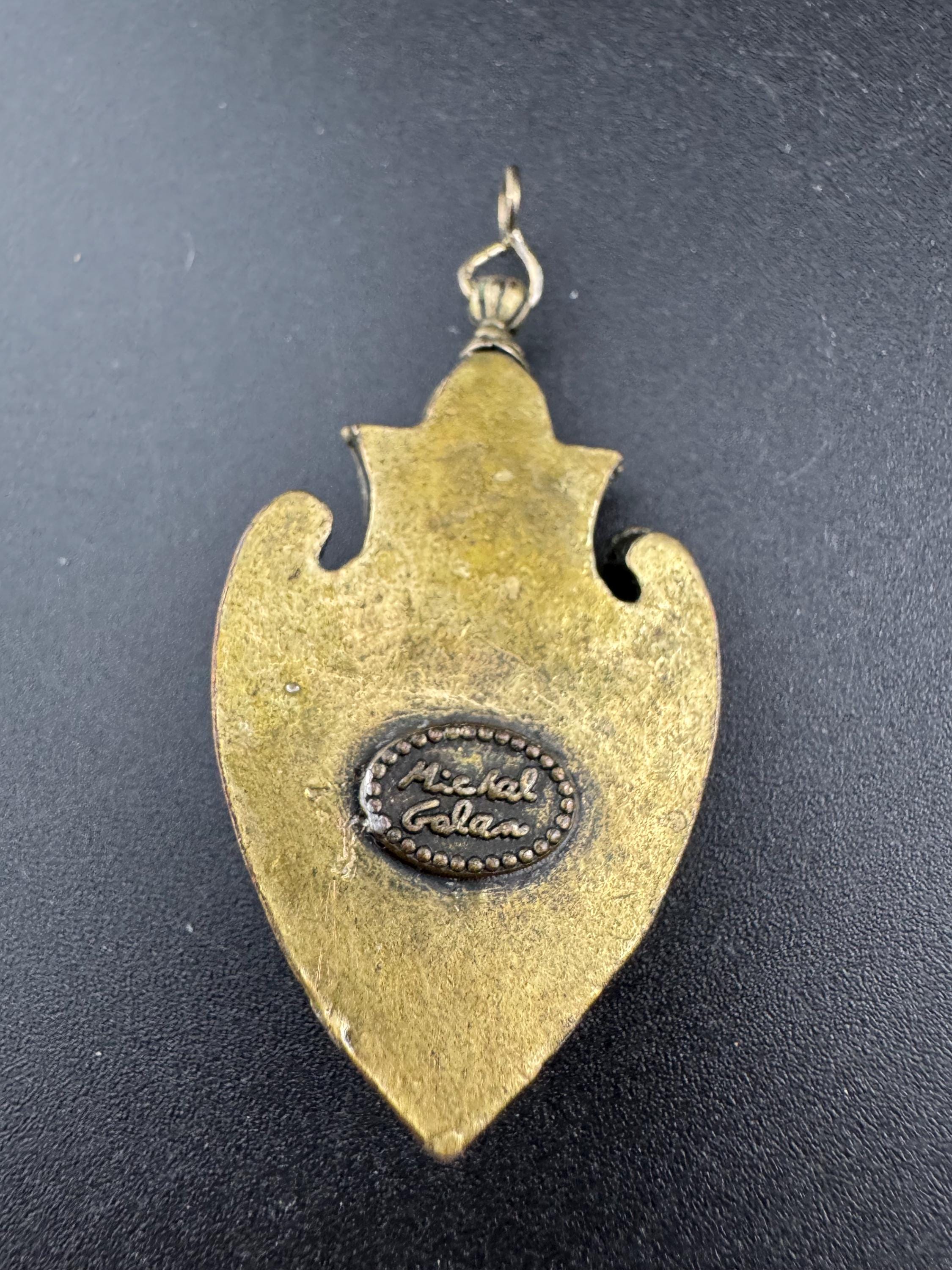 signed Michal Golan New York gold tone genstobe pendant,  Middle Eastern jewellery designer