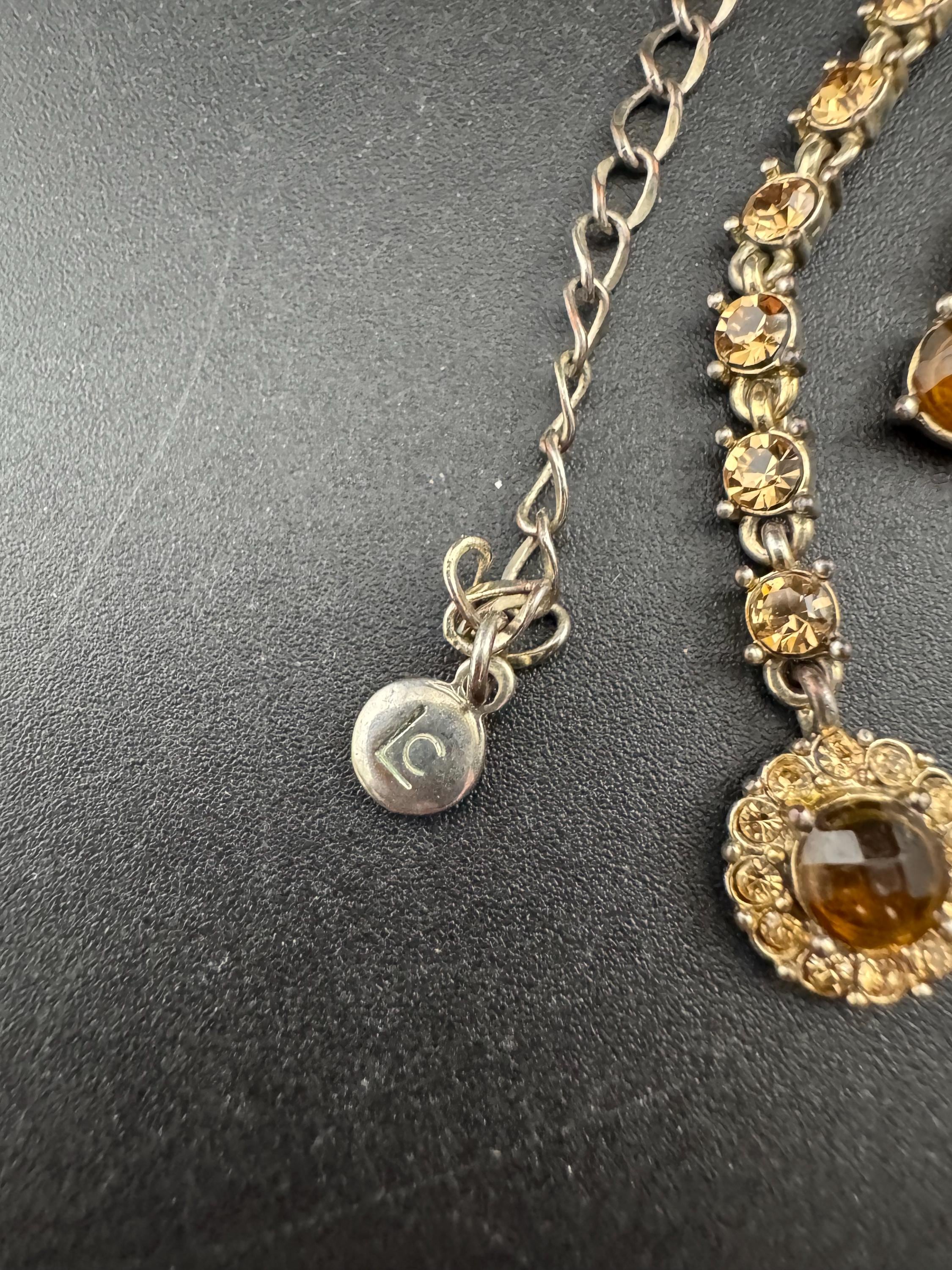 Signed Liz Claiborne silver tone brown orange rhinestone tassel necklace