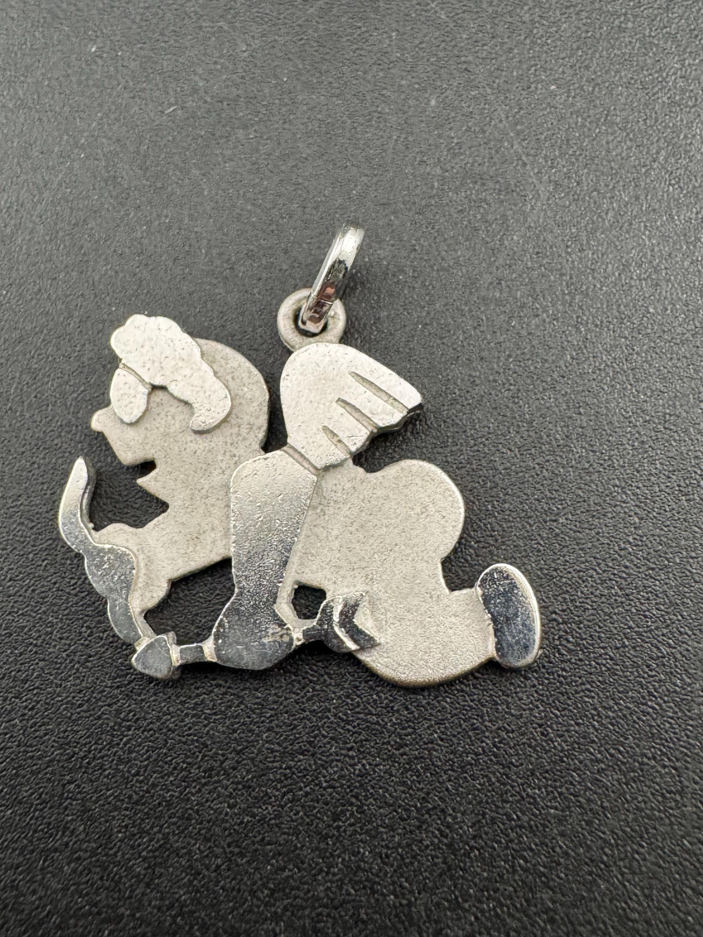 Novelty vintage 1970s 925 sterling silver modernist Cupid and arrow lovers pendant