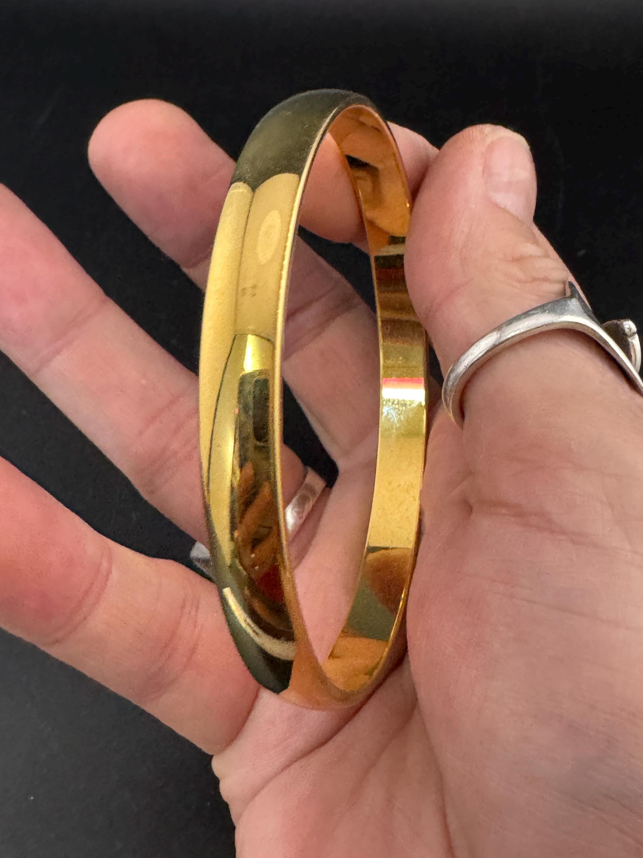 Vintage designer MONET signed glossy gold tone 1cm wide fixed bangle bracelet