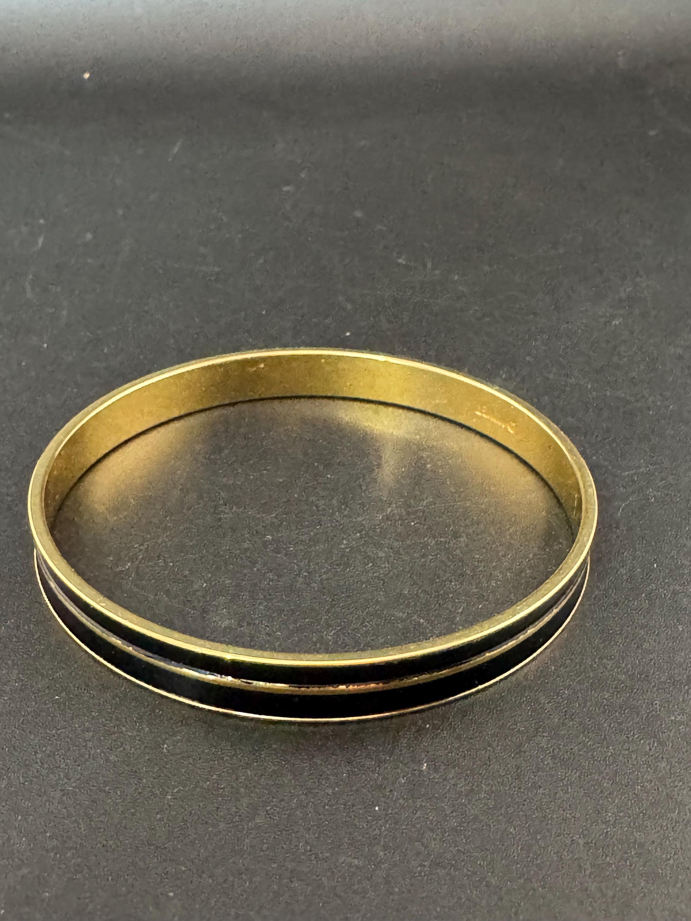 Vintage designer MONET signed glossy gold tone black enamel banded 1cm wide fixed bangle bracelet