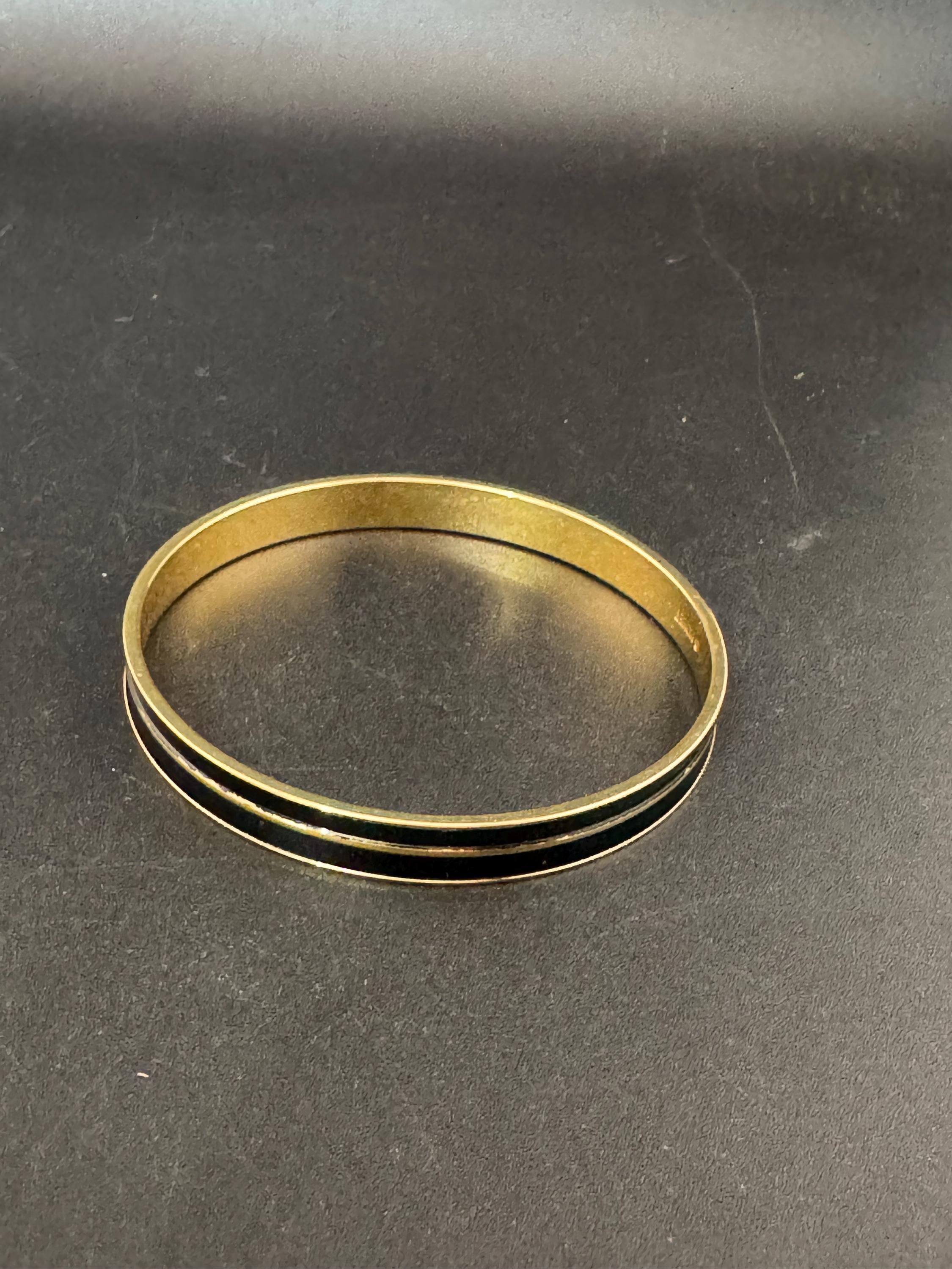 Vintage designer MONET signed glossy gold tone black enamel banded 1cm wide fixed bangle bracelet