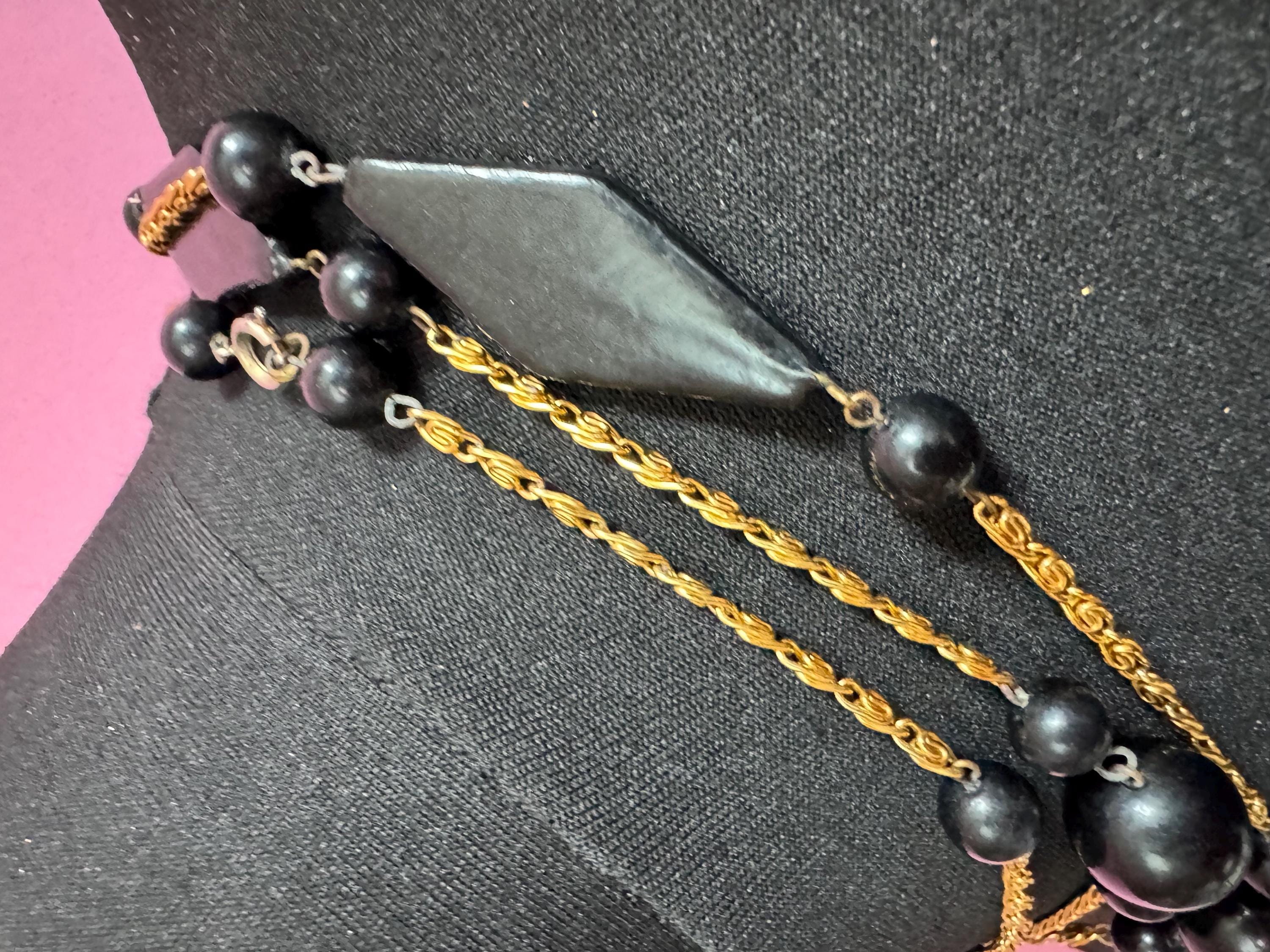 vintage 142cm long 1980s gold tone  scroll chain link black beaded station necklace