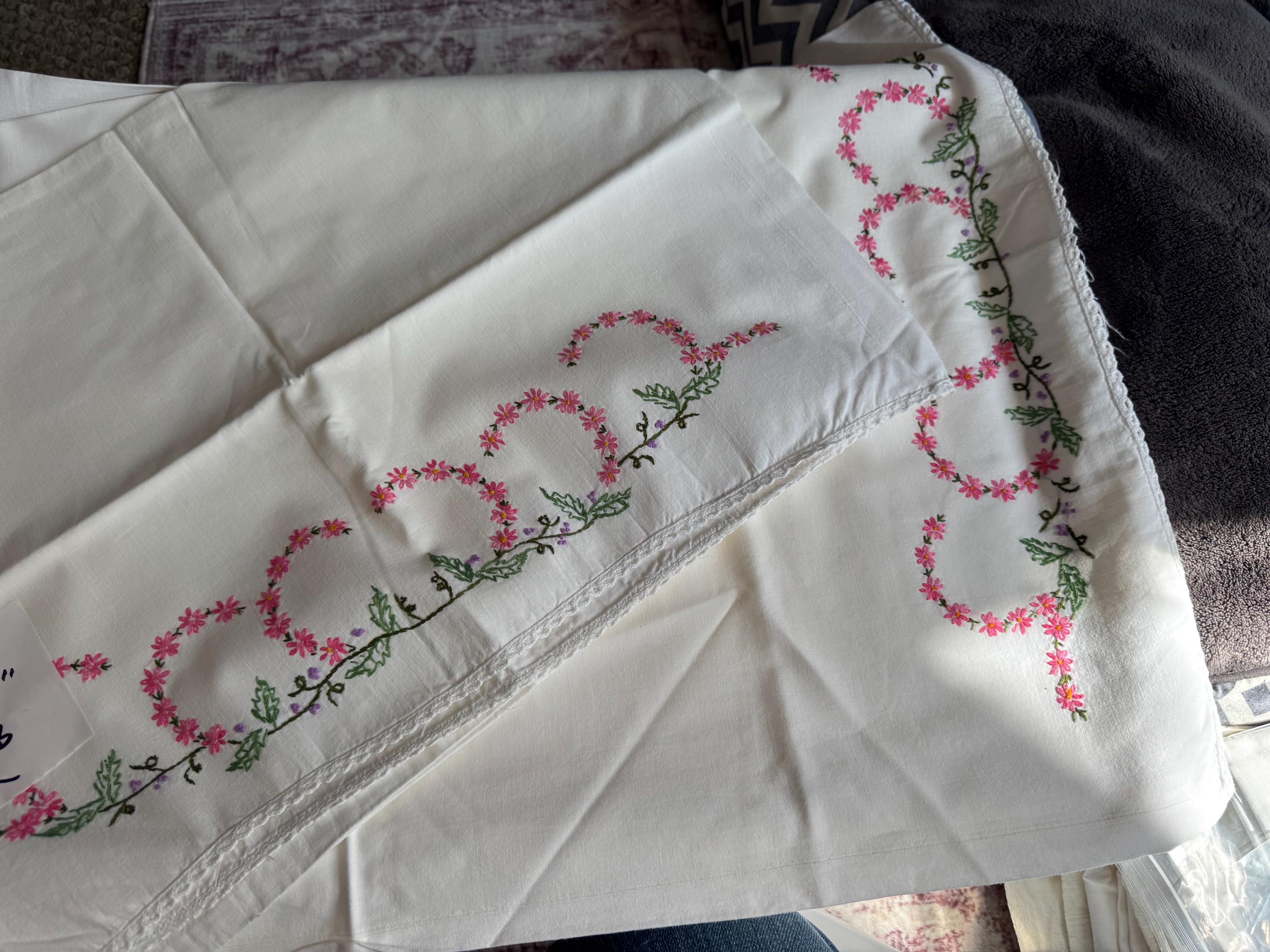 Vintage HAND embroidered floral pair of pillowcases pink green purple flowers pastels