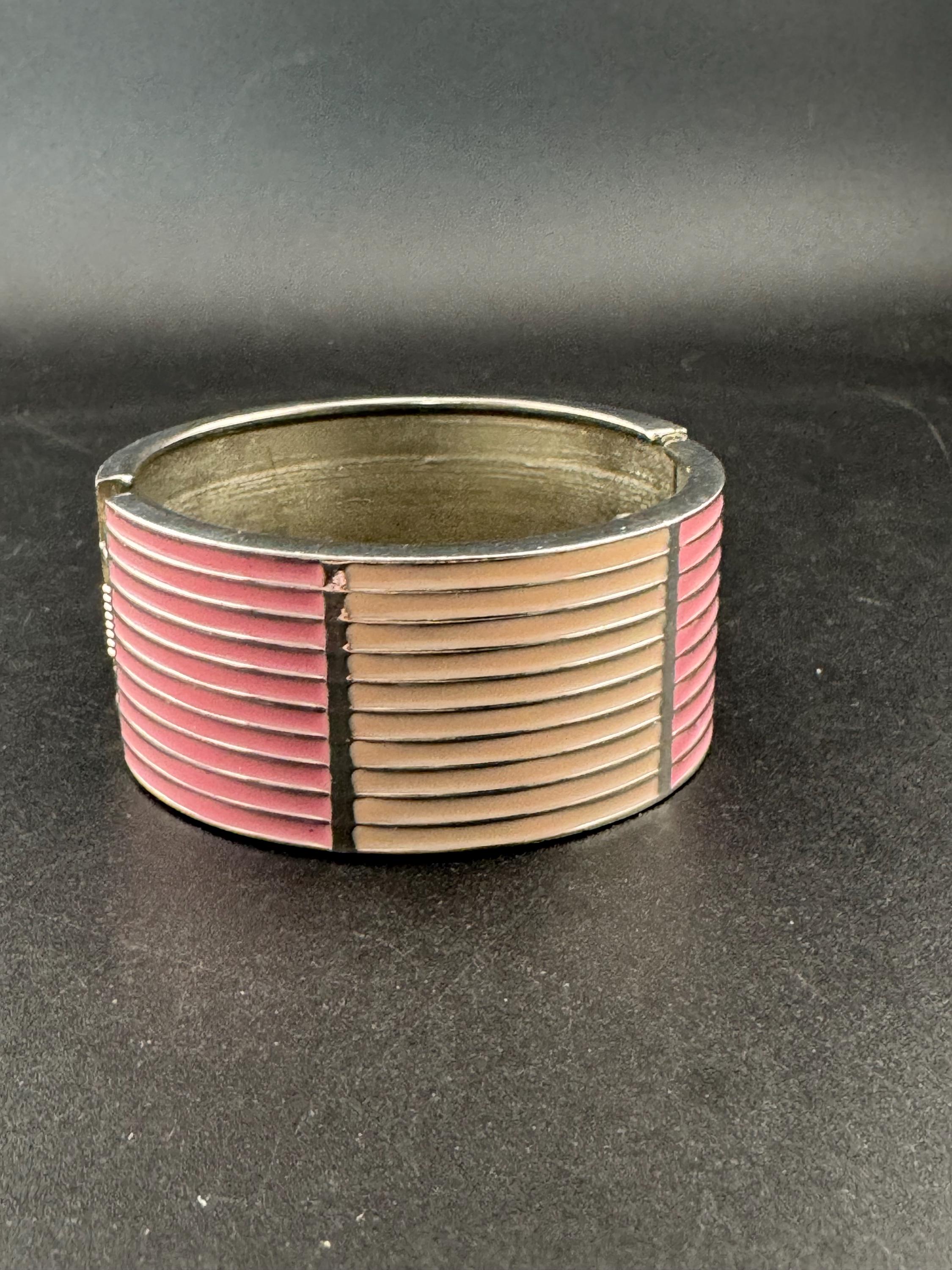 Vintage wide silver tone hinged pink enamel clamper bangle bracelet