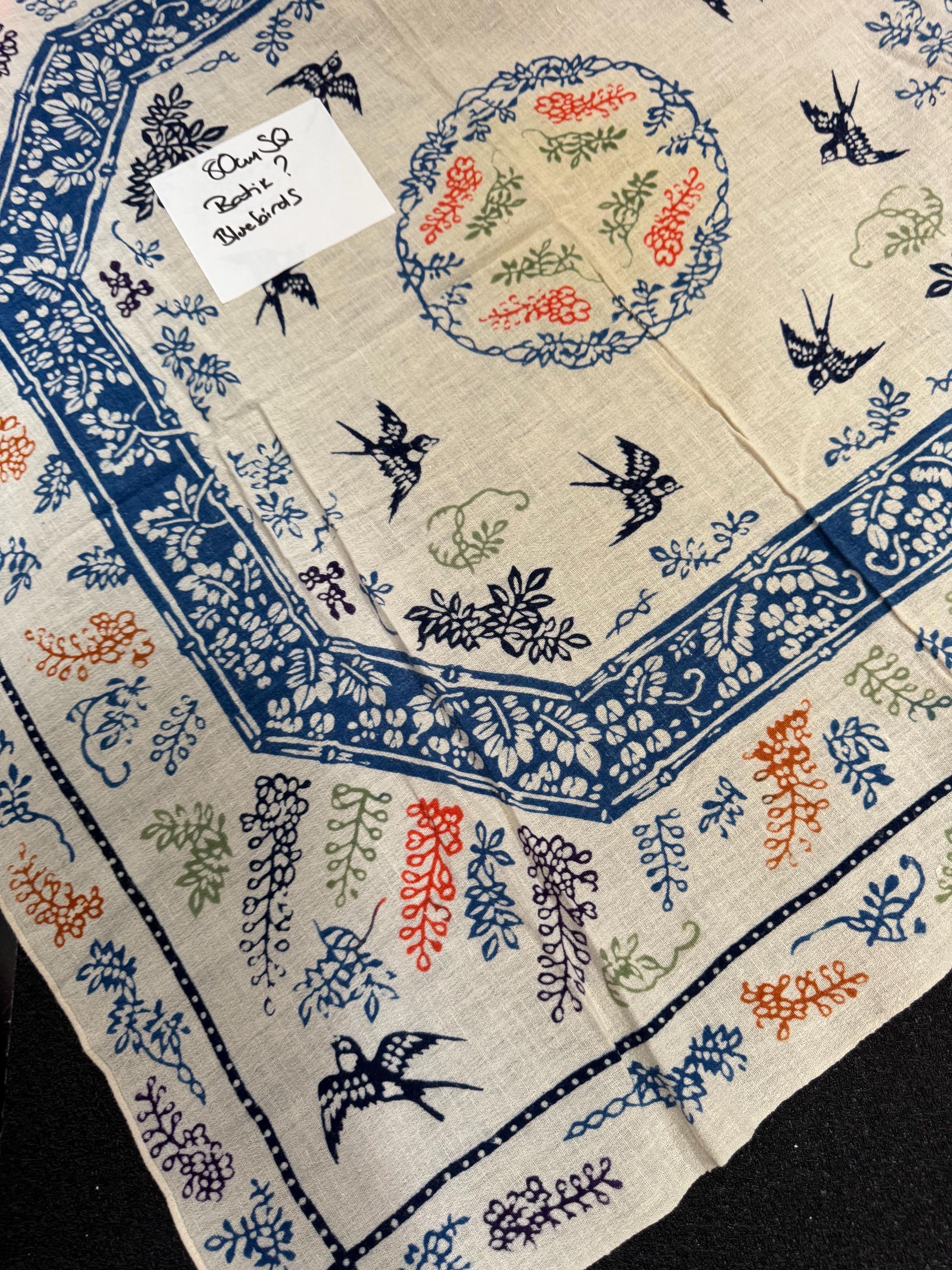 80cm square boho vintage batik print tablecloth printed with bluebirds and orange and blue florals