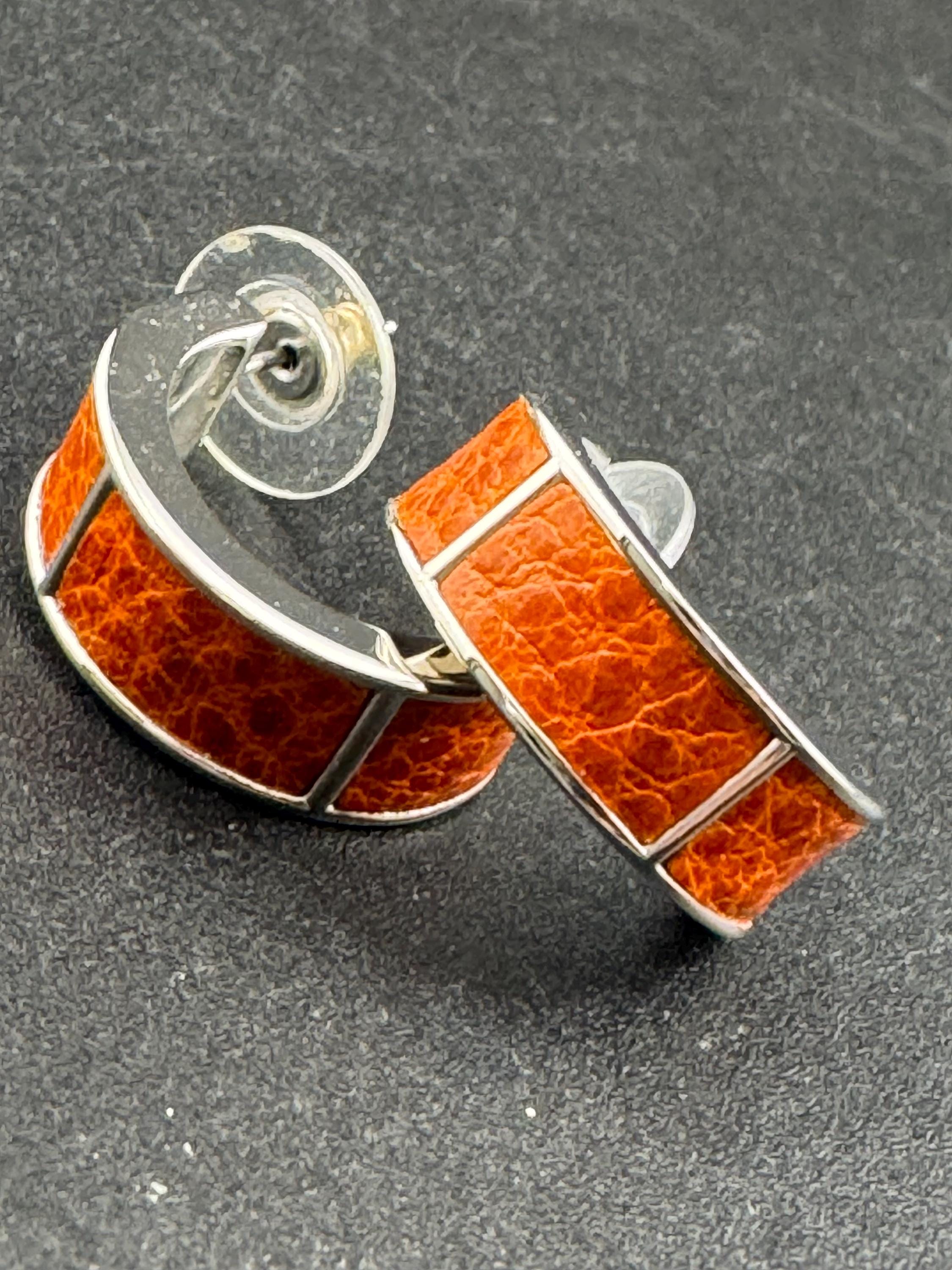 Retro silver tone wide bright orange animal print  hoop pierced earrings