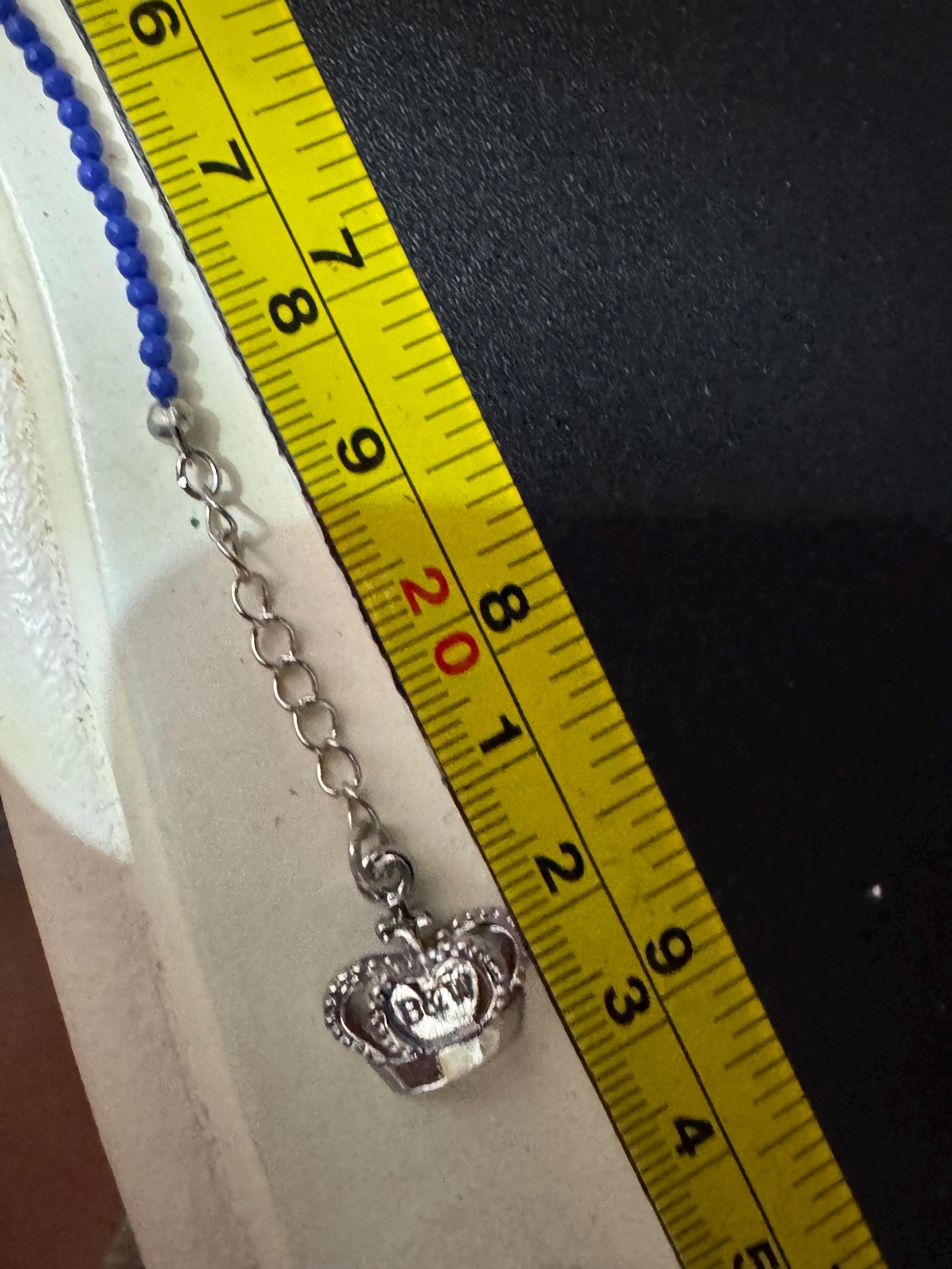 Retro Butler and Wilson boxed dainty clear diamanté blue evil eye silver tone tennis charm bracelet