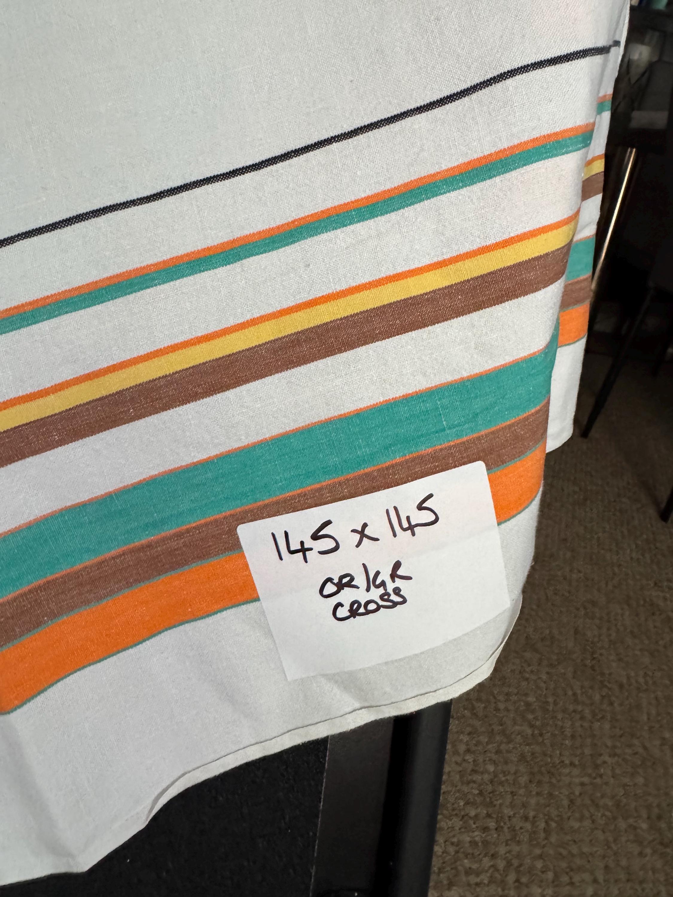 Large 145cm near square off white with orange brown green and yellow geometric stripes and check large printed tablecloth