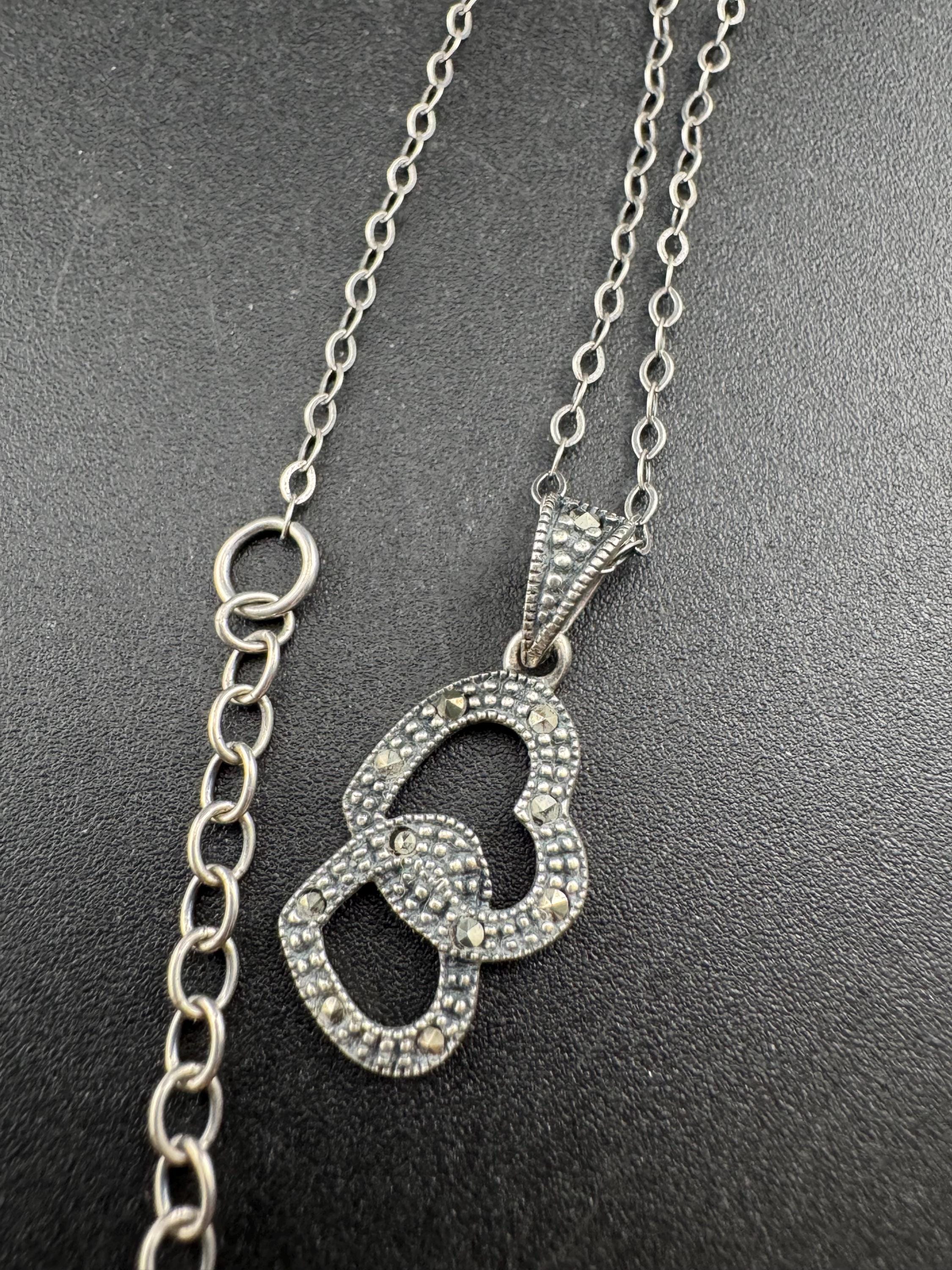 sterling silver and marcasite double love heart shaped pendant 3cm 3.6 grams on a 46cm 925 chain