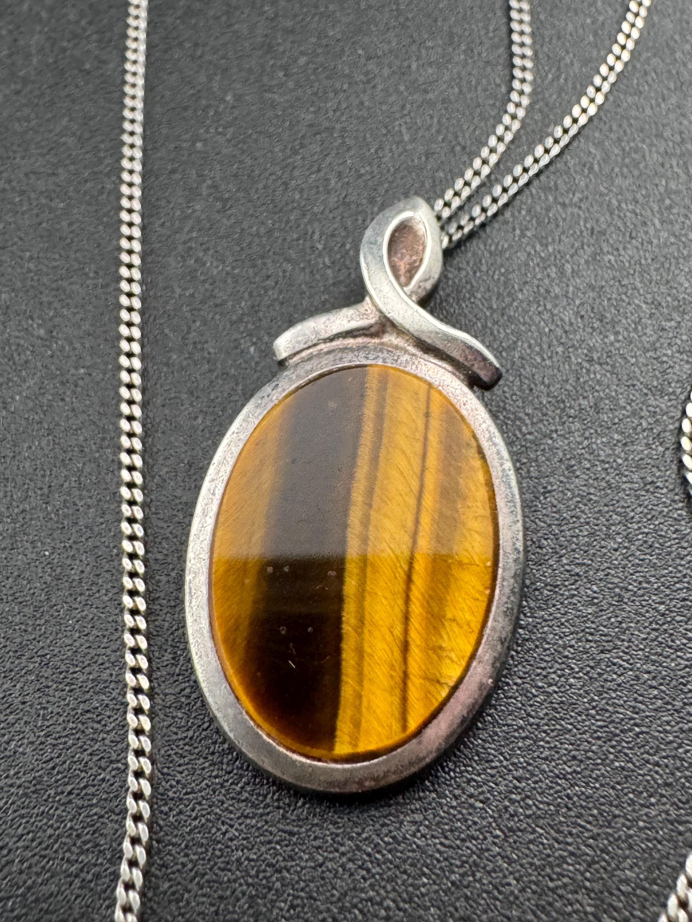 Solid silver tigerseye dainty oval gemstone pendant necklace on 46cm chain 1970s weighs 5.2 grams