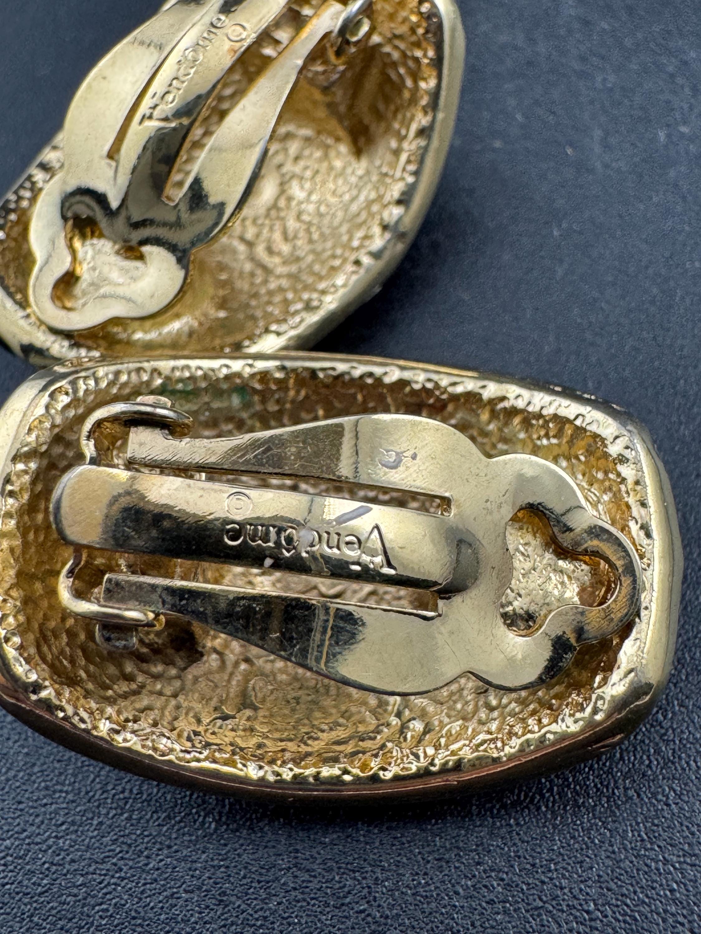 Vintage signed Vendome Gold tone cream striped enamel clip on earrings