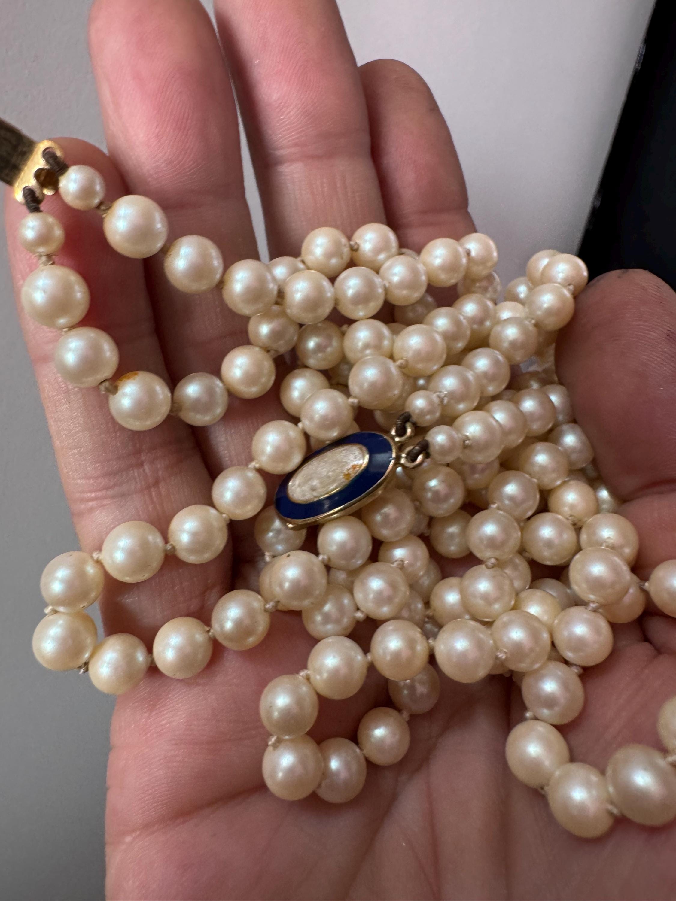 Cream Knotted Glass Pearl Necklace: Gold Plated Enamel Clasp