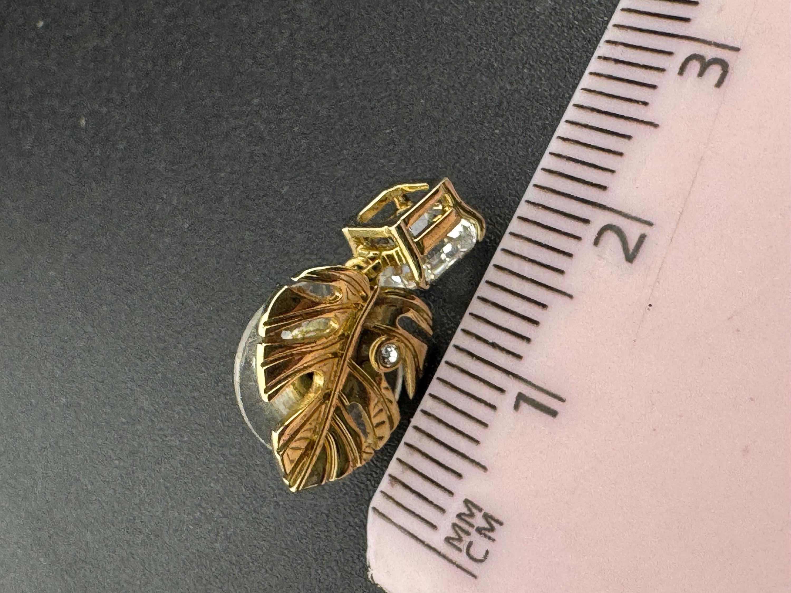 Signed Swarovski gold plated small clear crystal palm leaf pierced drop earrings