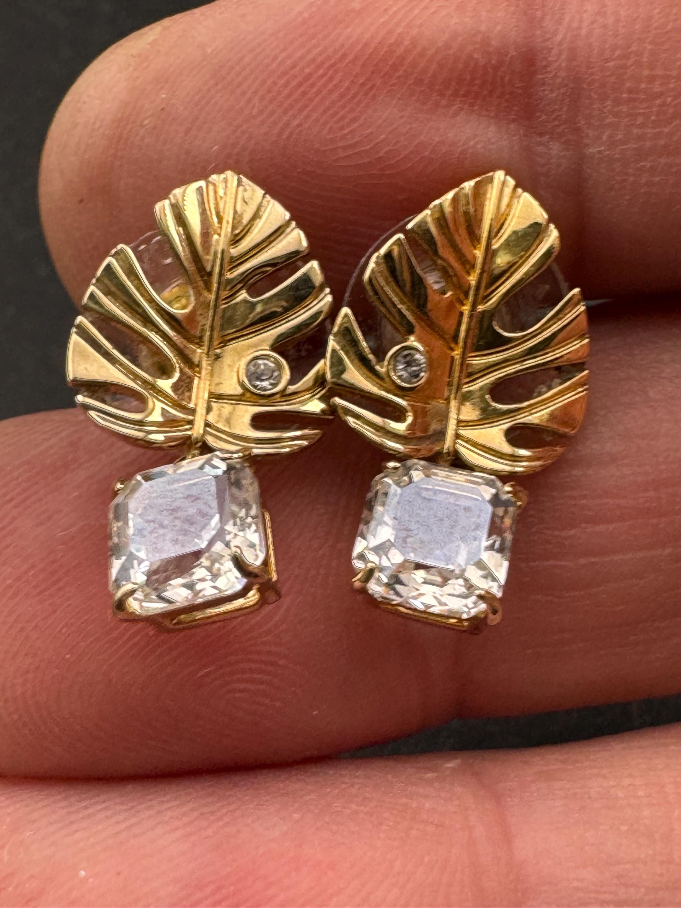 Signed Swarovski gold plated small clear crystal palm leaf pierced drop earrings