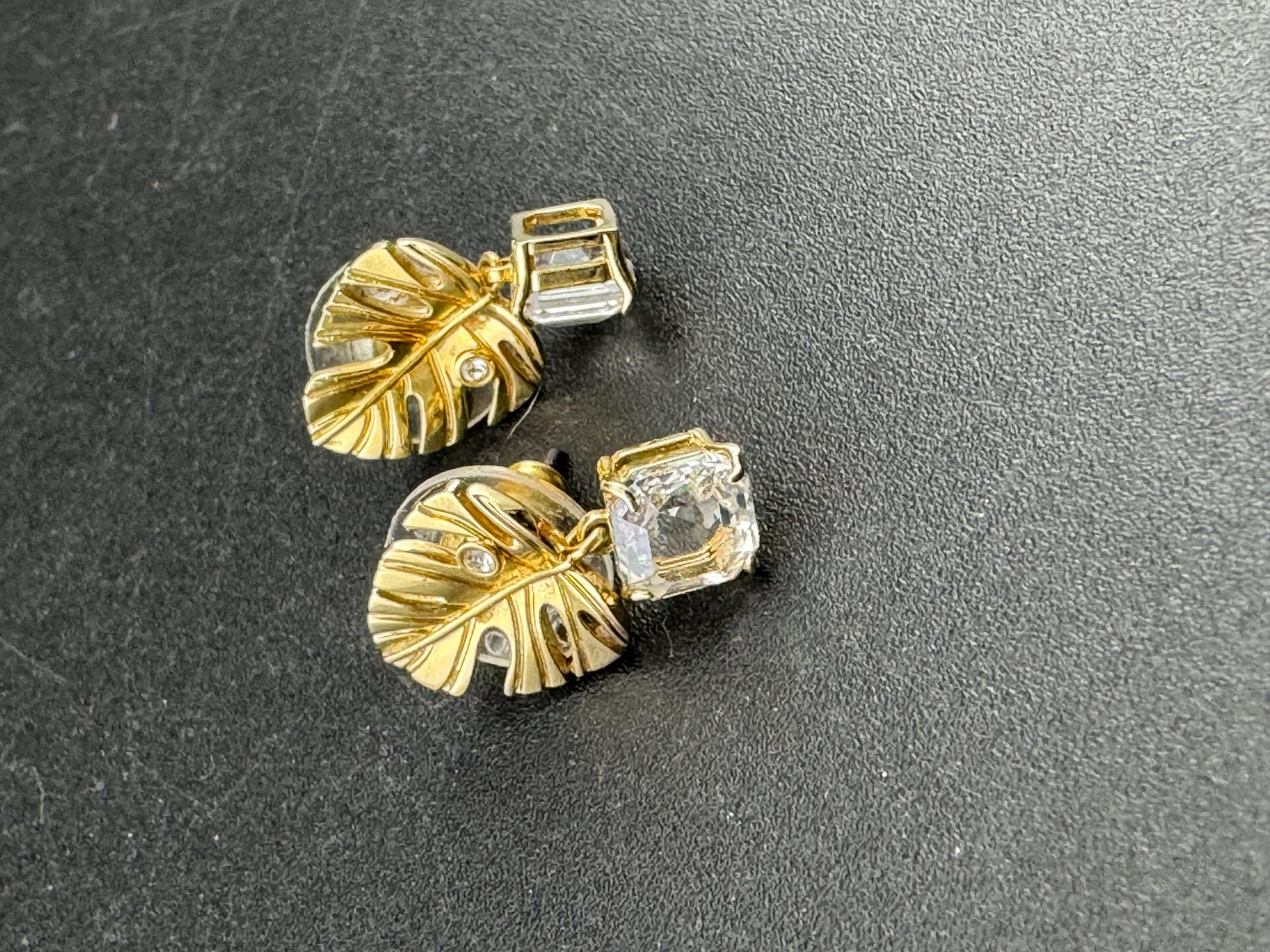Signed Swarovski gold plated small clear crystal palm leaf pierced drop earrings