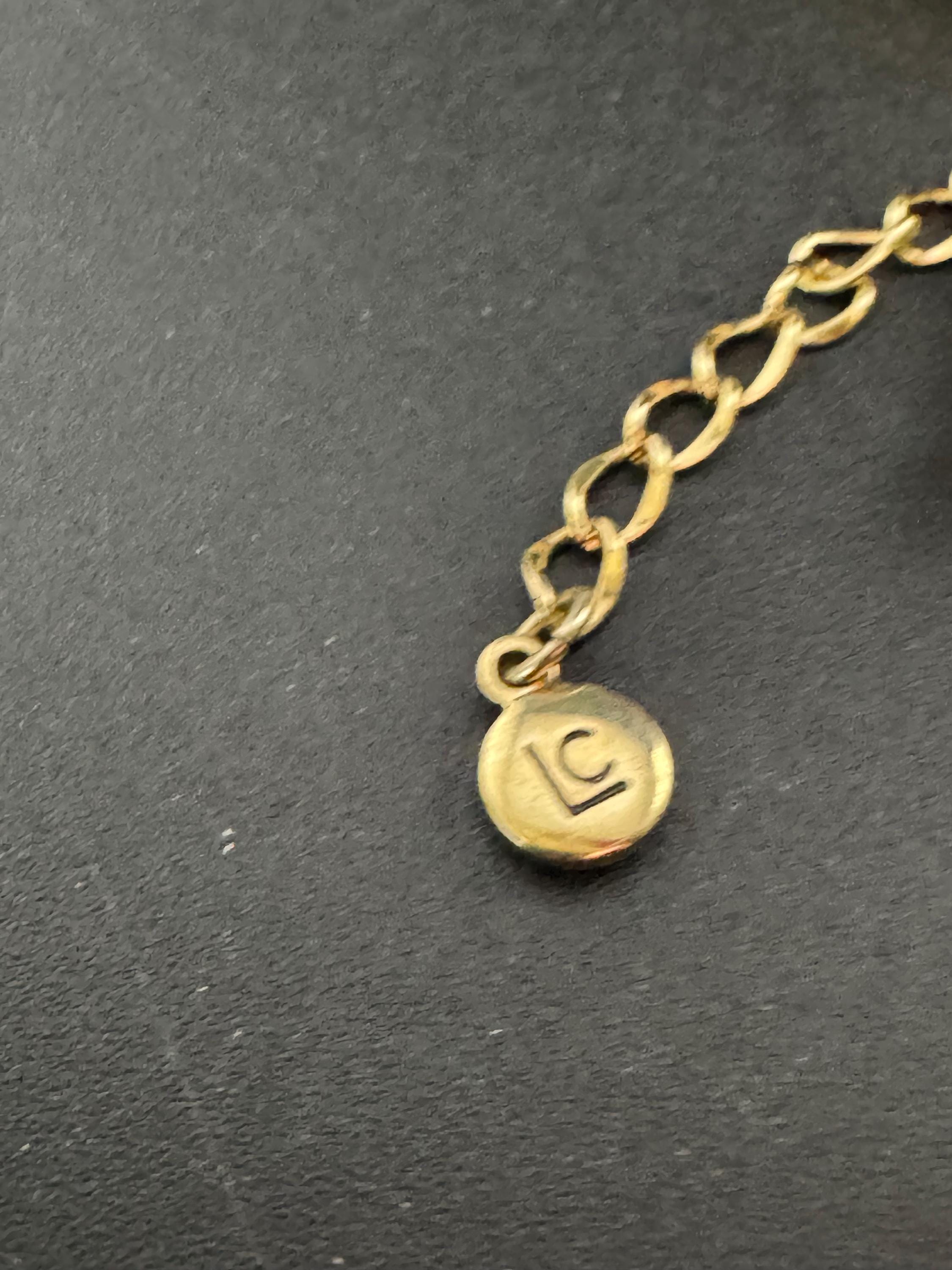 Signed Liz Claiborne designer gold tone weighty oval metal and glass beaded Multistrand 2 row necklace