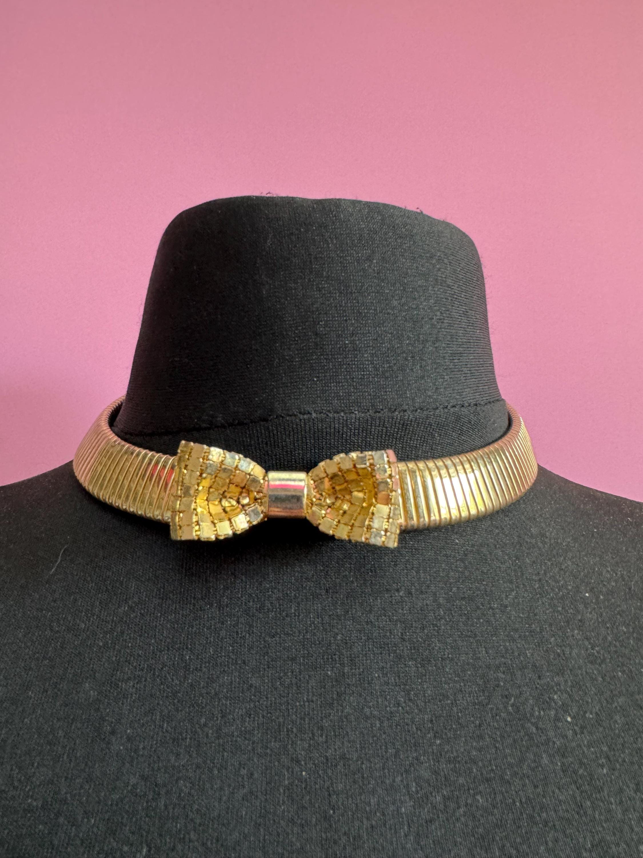 Vintage 1980s gold tone omega choker collar necklace with mesh bow detail
