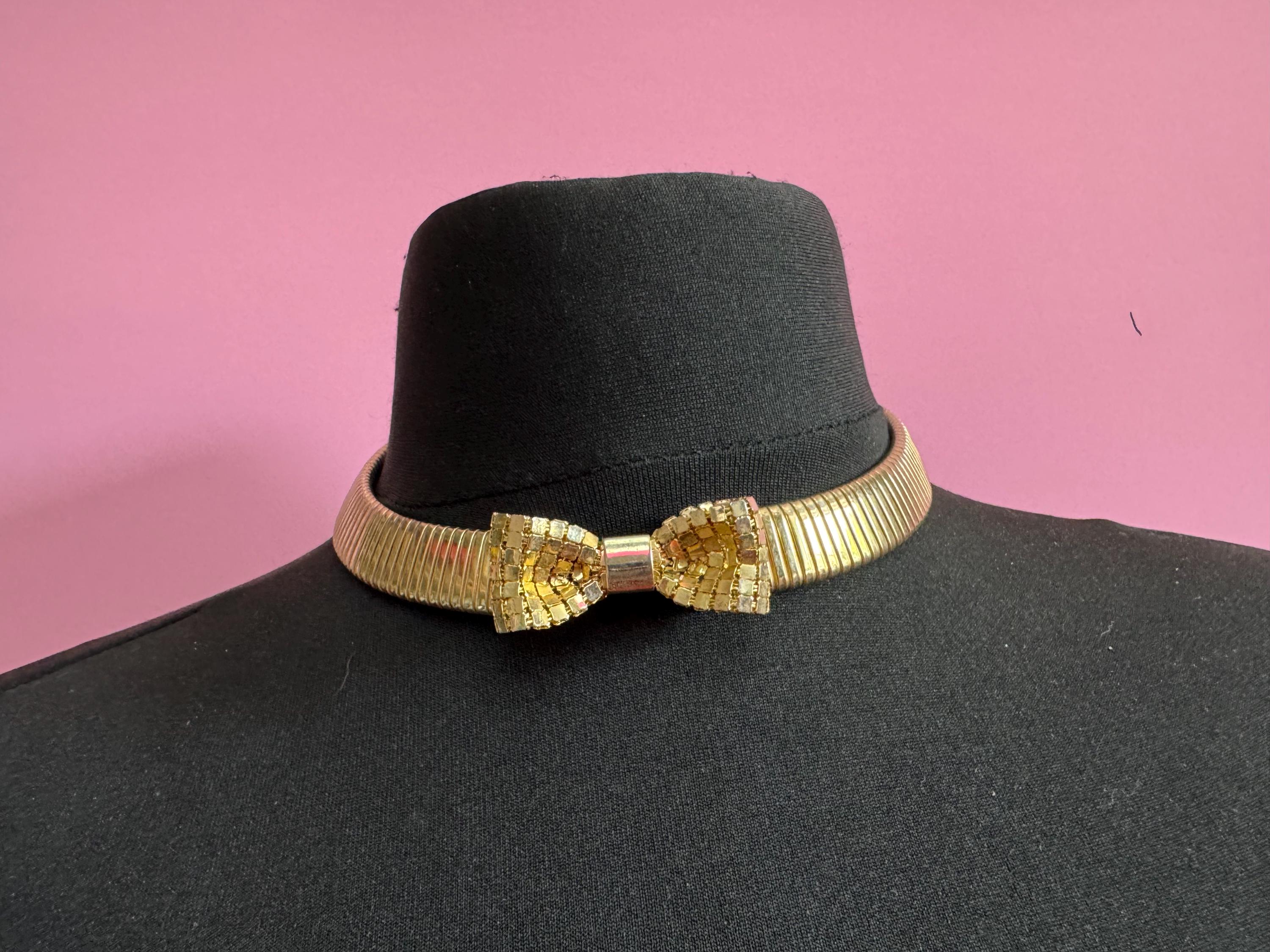 Vintage 1980s gold tone omega choker collar necklace with mesh bow detail