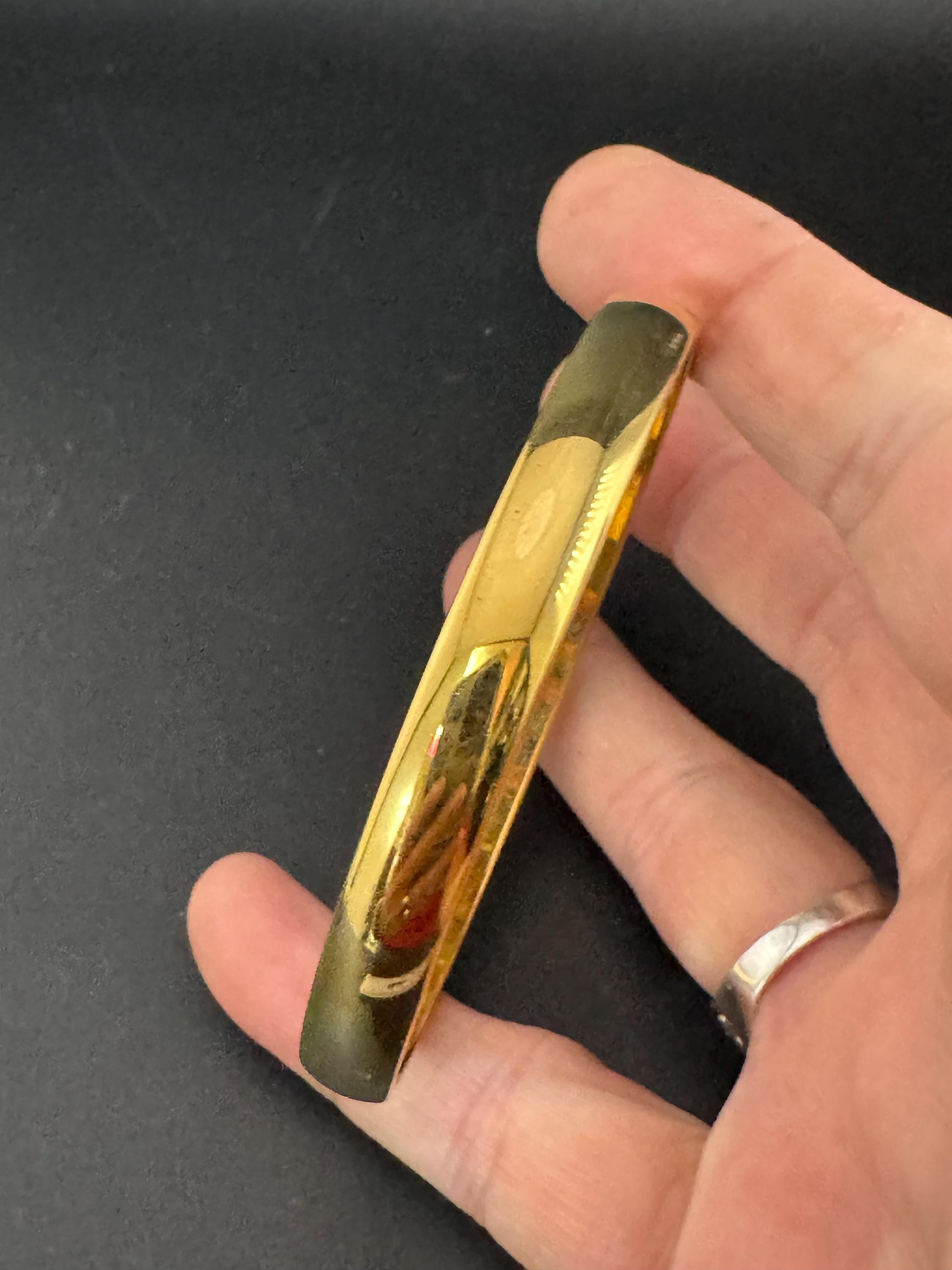 Vintage designer MONET signed glossy gold tone 1cm wide fixed bangle bracelet