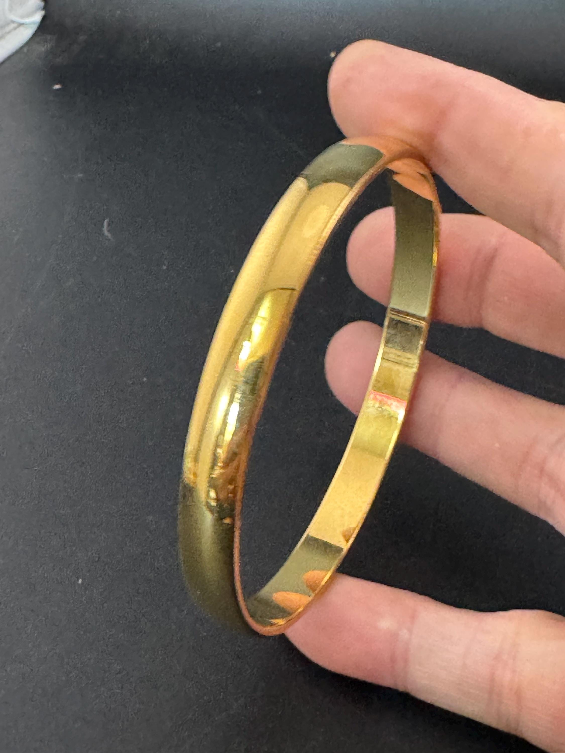 Vintage designer MONET signed glossy gold tone 1cm wide fixed bangle bracelet