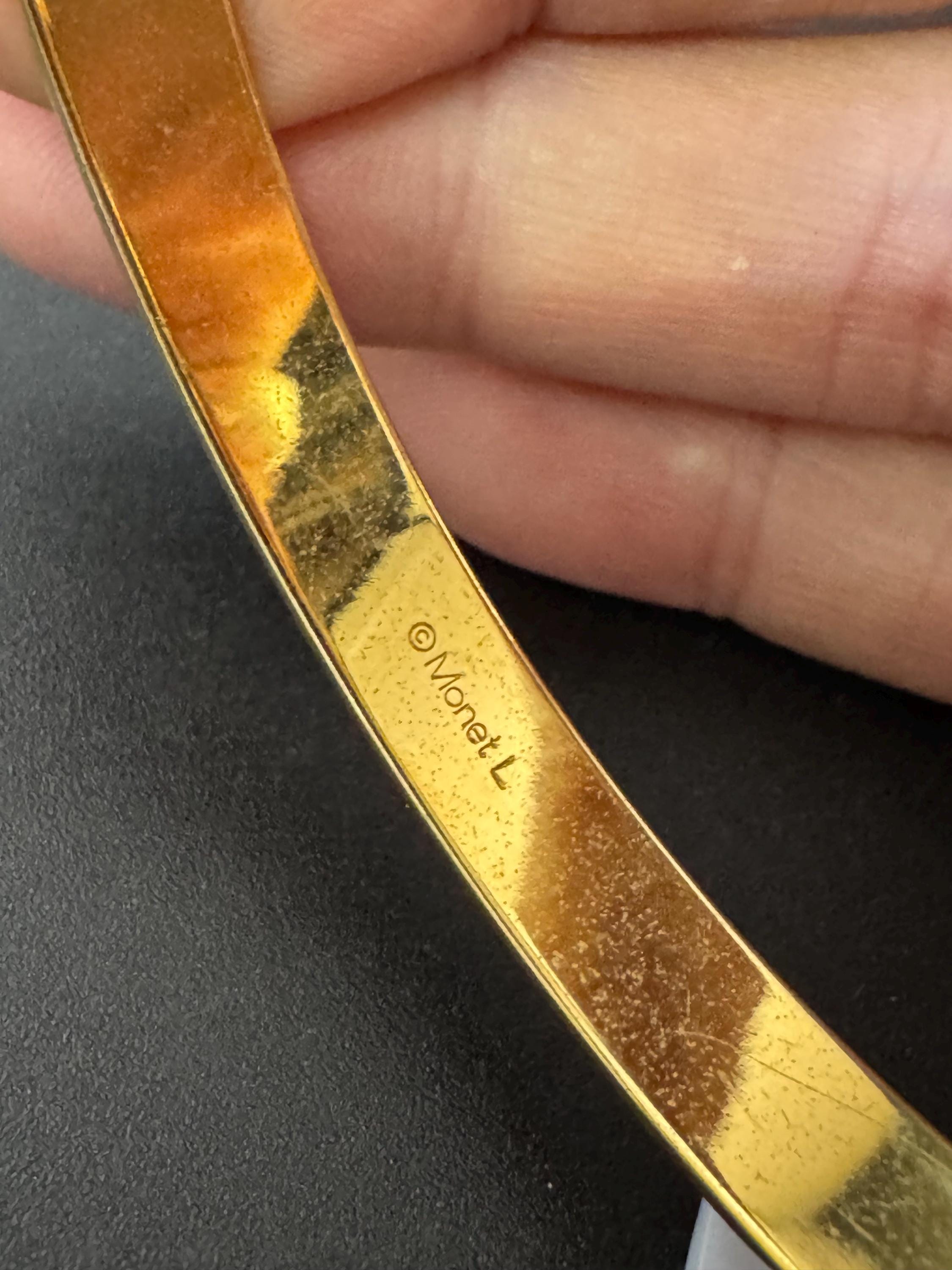 Vintage designer MONET signed glossy gold tone 1cm wide fixed bangle bracelet