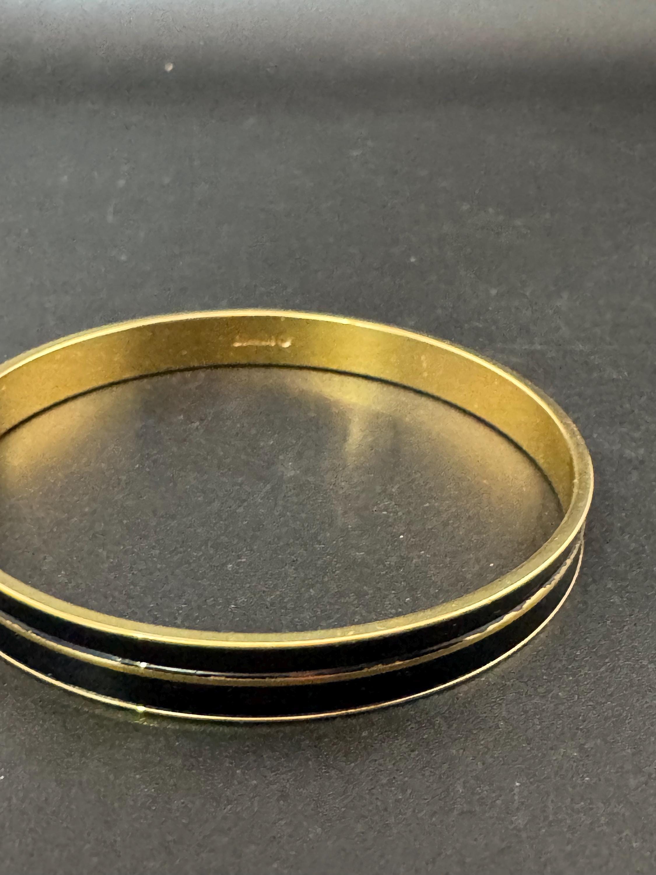 Vintage designer MONET signed glossy gold tone black enamel banded 1cm wide fixed bangle bracelet